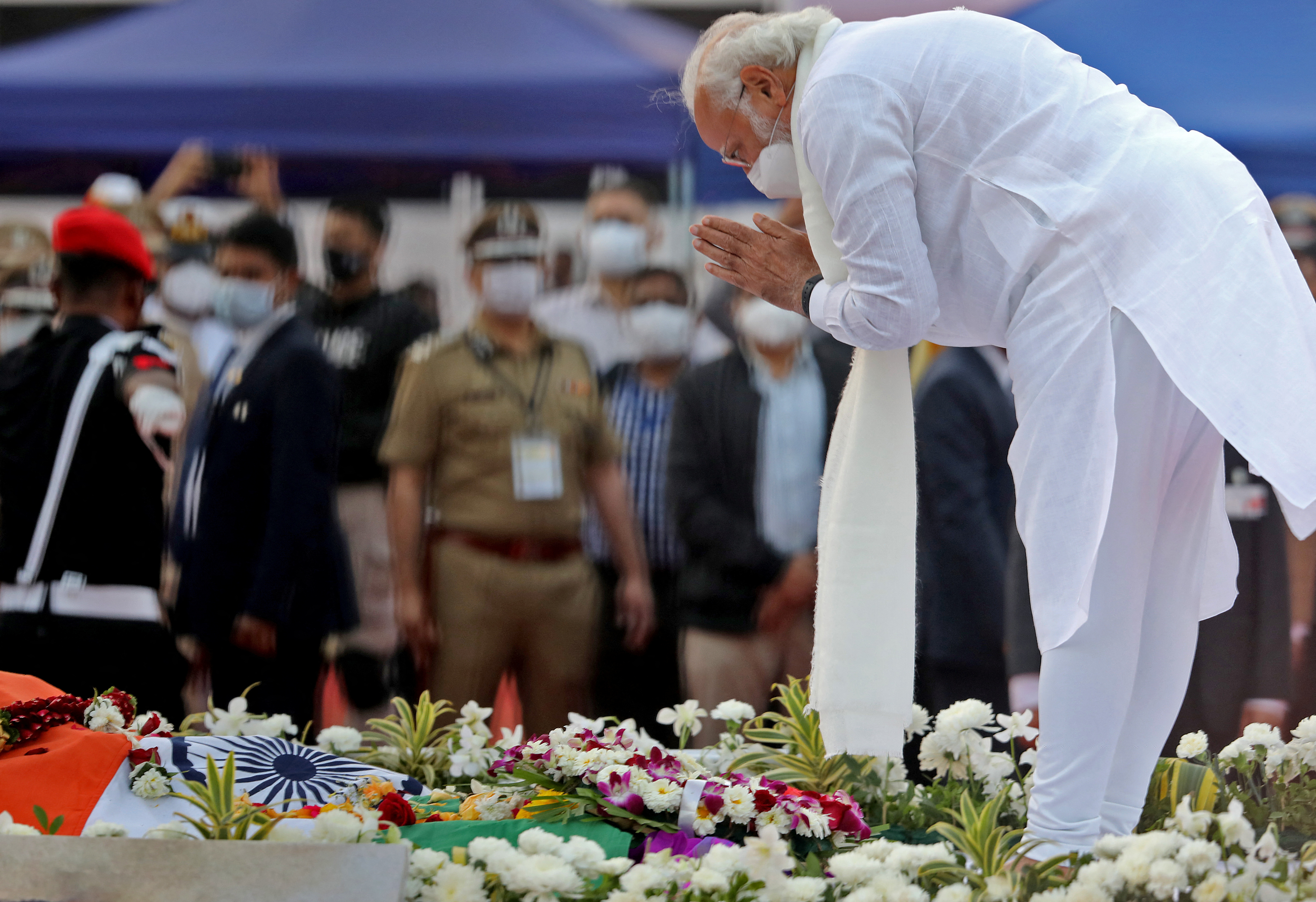 India’s Prime Minister Narendra Modi pays his respects to late Indian singer Lata Mangeshkar during her funeral at Shivaji Park in Mumbai, India, February 6, 2022