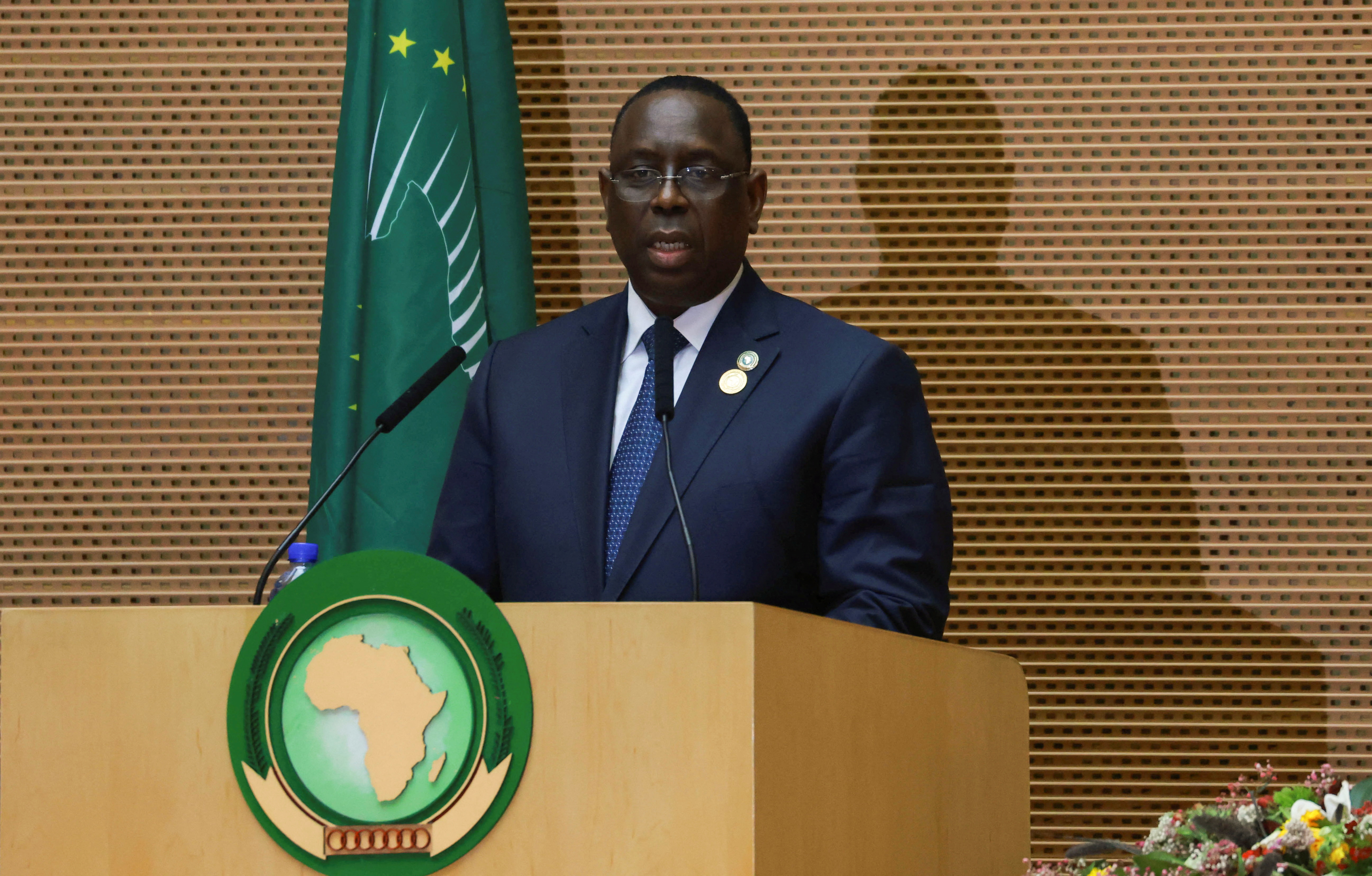 Senegal’s President Macky Sall addresses the closing of the 35th ordinary session of the Assembly of the African Union at the AU Commission headquarters in Addis Ababa, Ethiopia on February 6, 2022