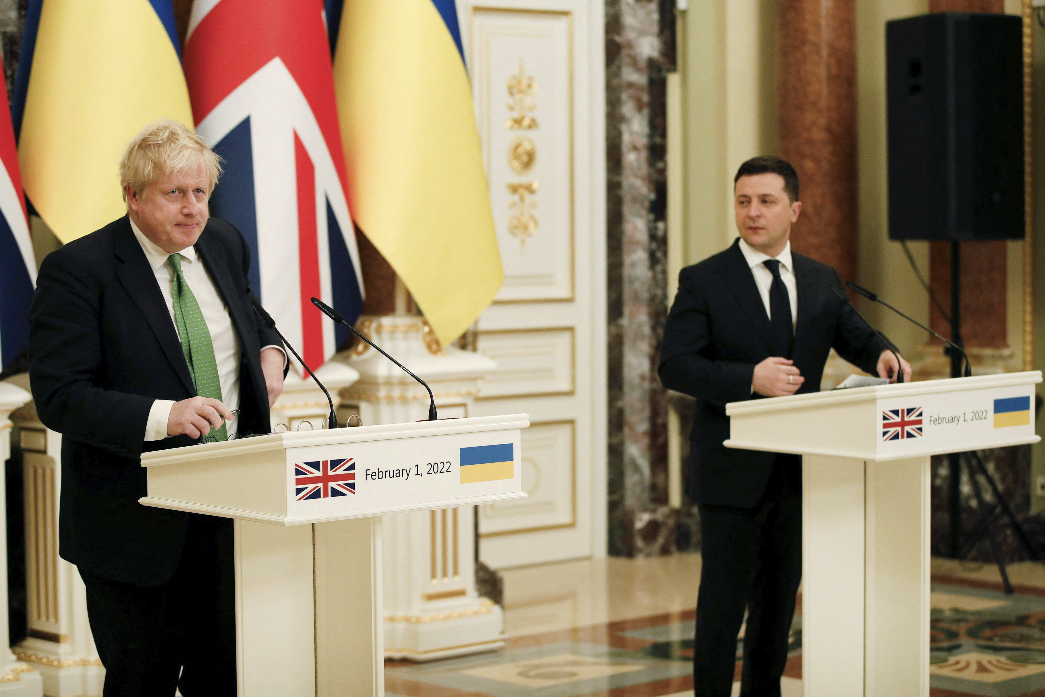 UK Prime Minister Boris Johnson, left, takes part in a news conference with Ukrainian President Volodymyr Zelenskyy in Kyiv on Tuesday