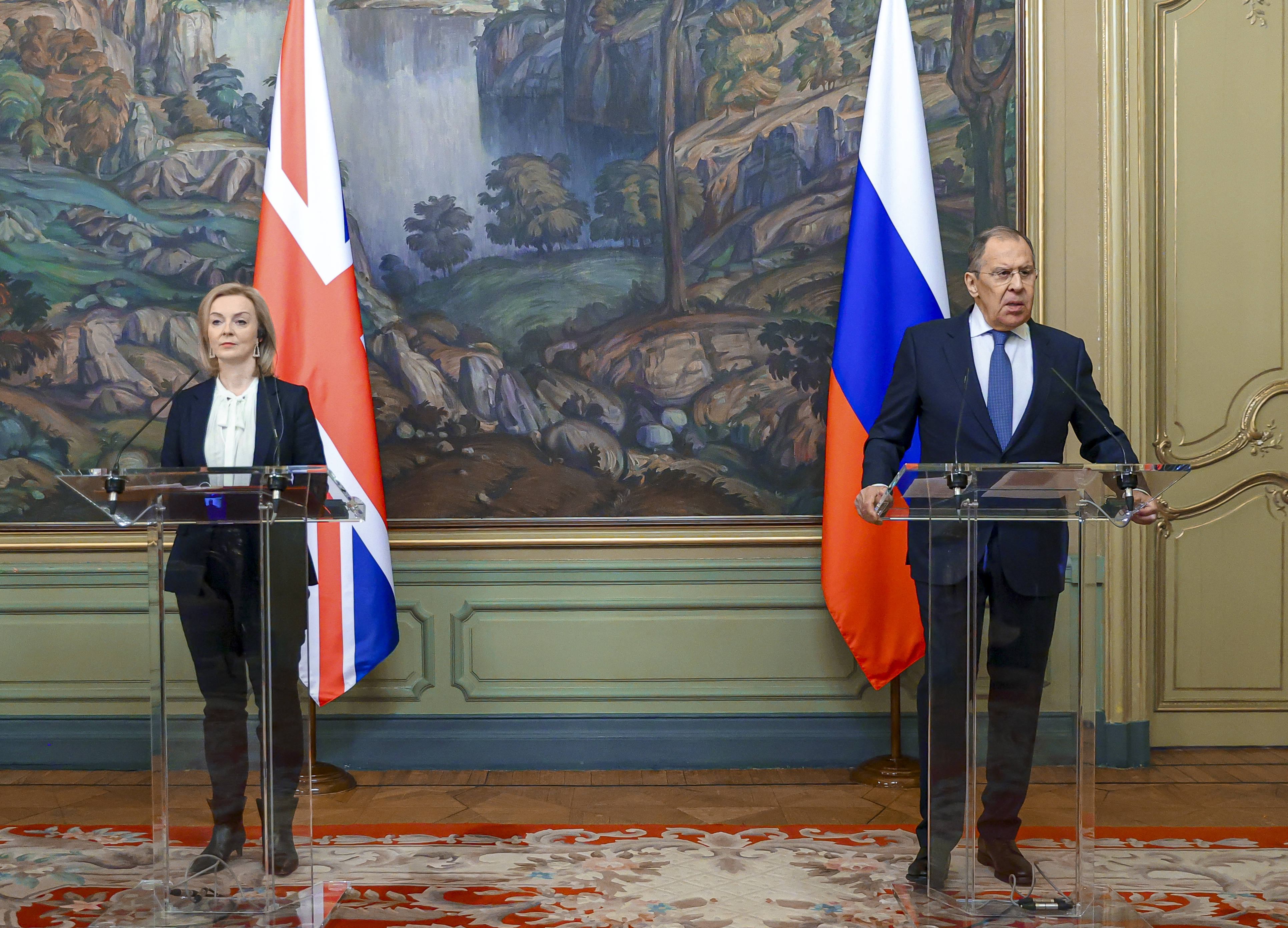 Russian Foreign Minister Sergey Lavrov, right, and British Foreign Secretary Liz Truss