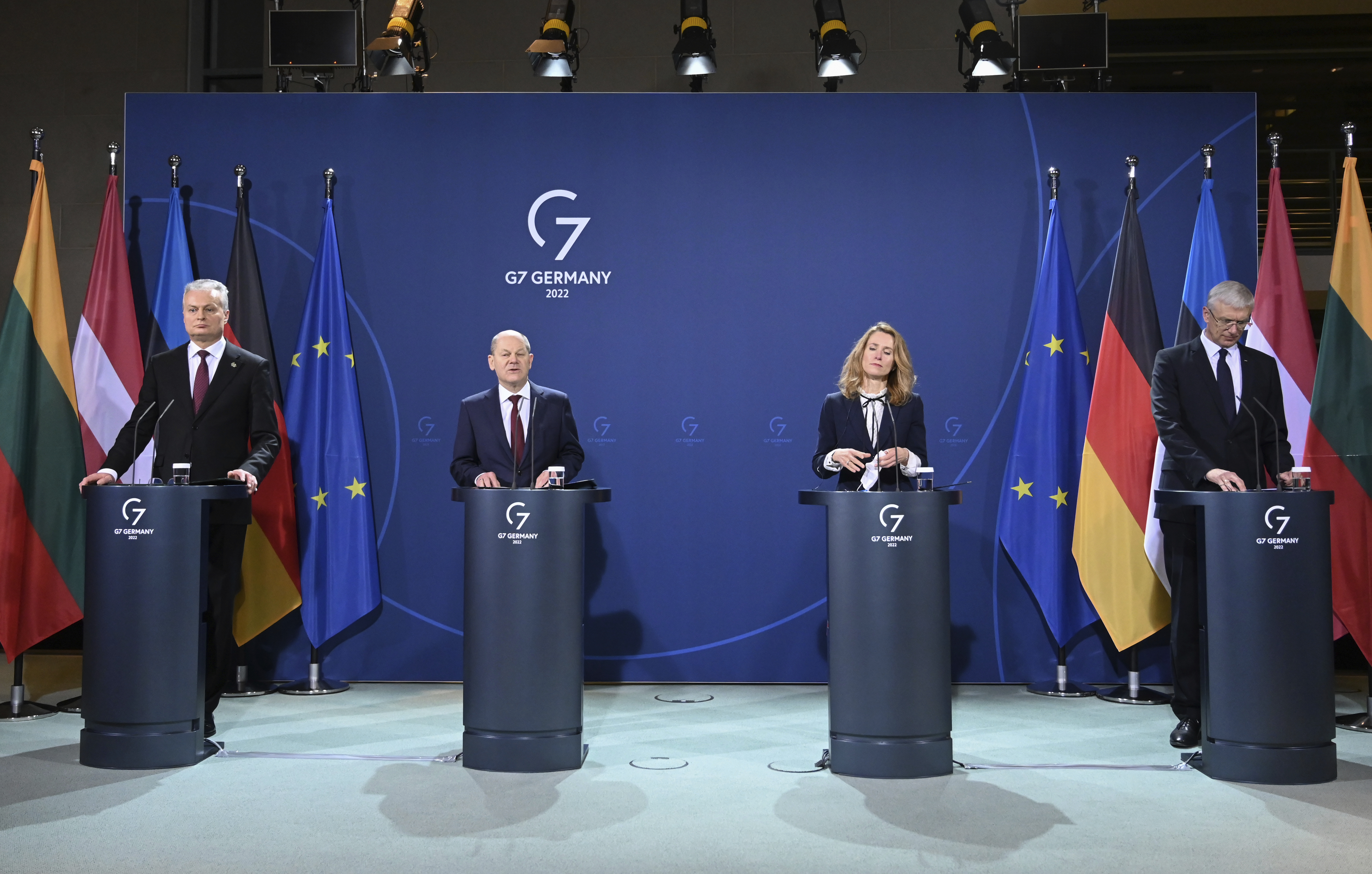 German Chancellor Olaf Scholz, centre left, speaks during a news conference with the leaders of the three Baltic states, Lithuanian President Gitanas Nauseda, left, Estonian Prime Minister Kaja Kallas and Latvia Prime Minister Karins, right, before consultations on the Ukraine crisis, at the Chancellery, Berlin