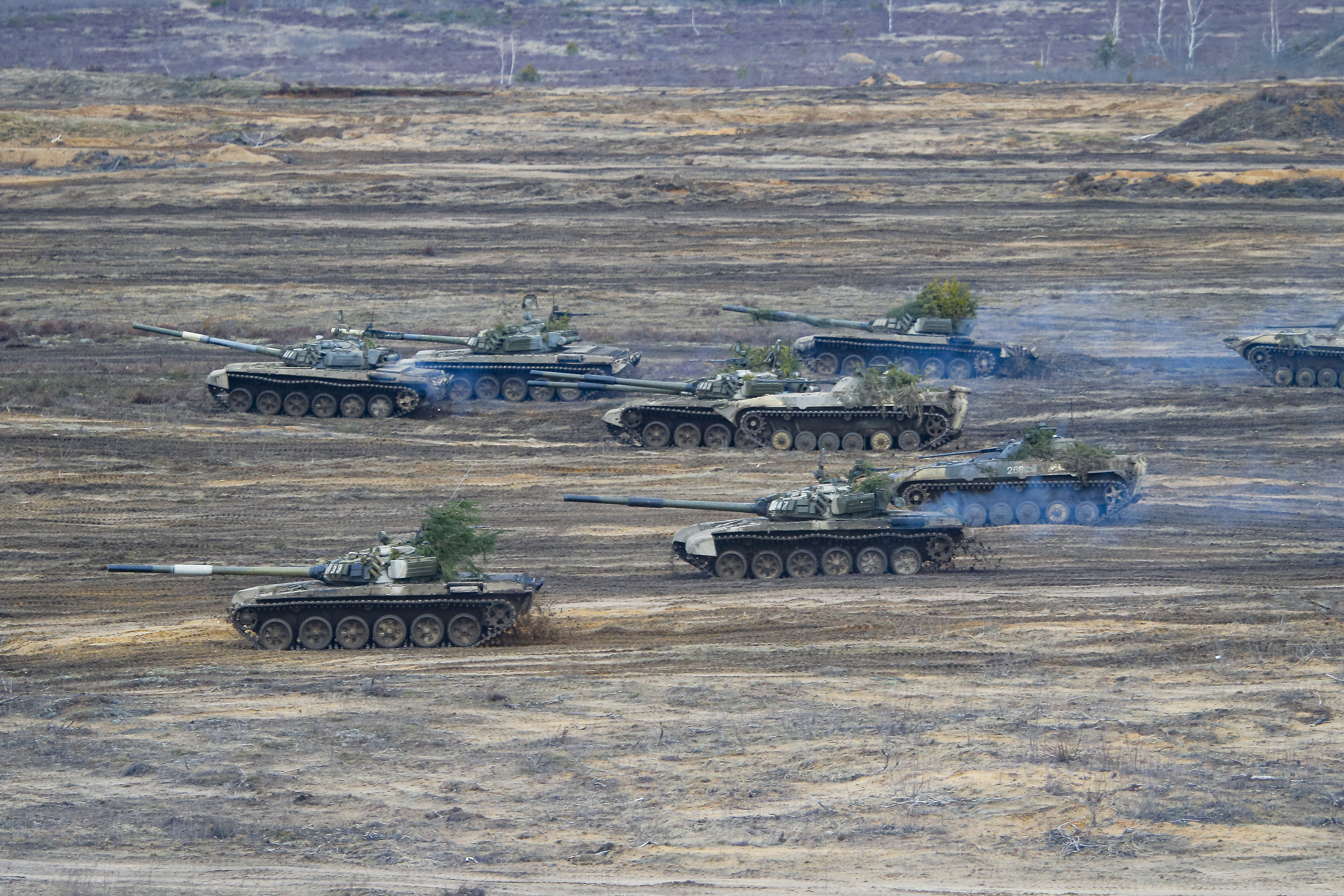 Tanks and armored vehicles move during the Union Courage-2022 Russia-Belarus military drills at the Obuz-Lesnovsky training ground in Belarus