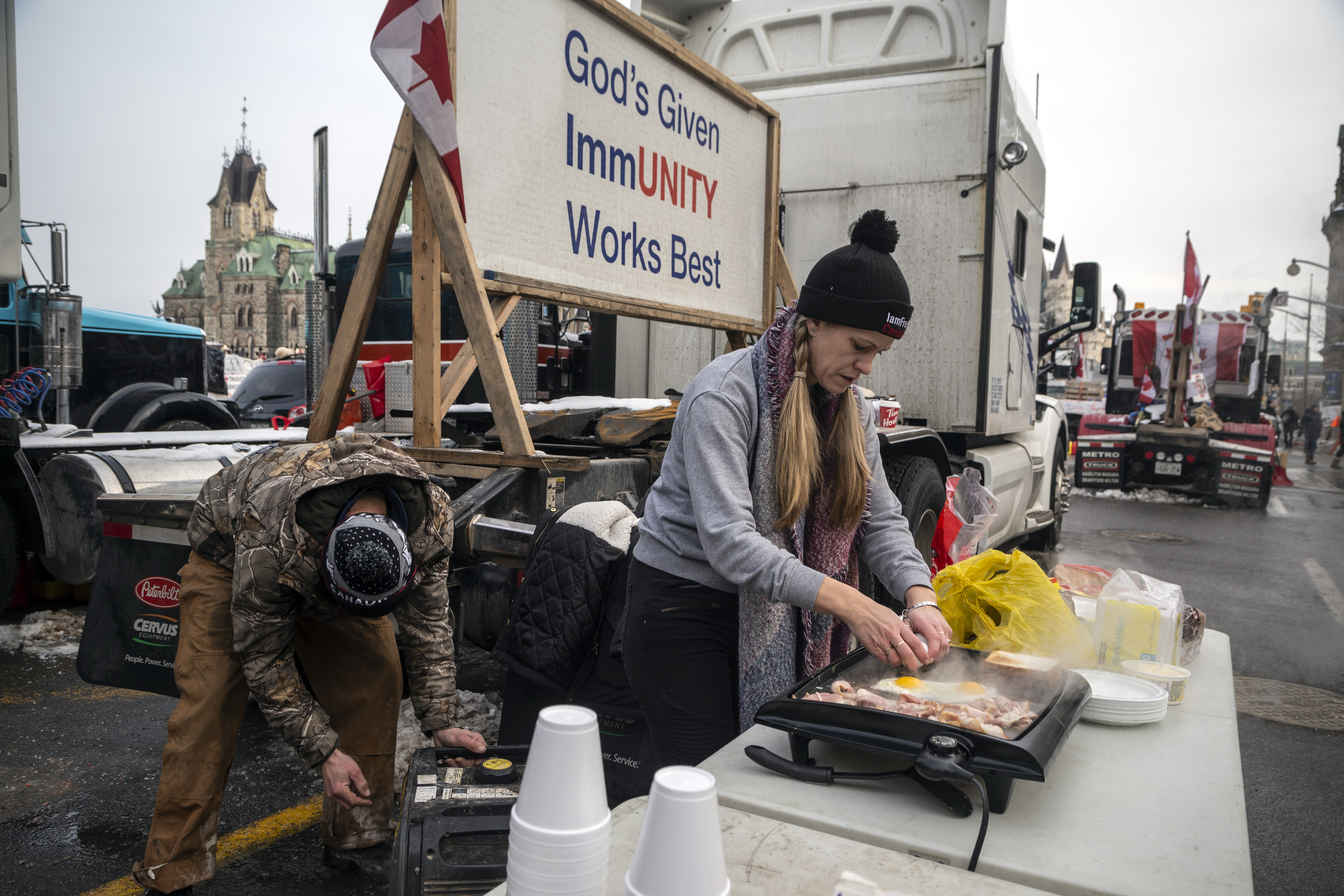 Roze Ravensbergen serves breakfast to anyone who wants it on the street outside the Canadian parliament