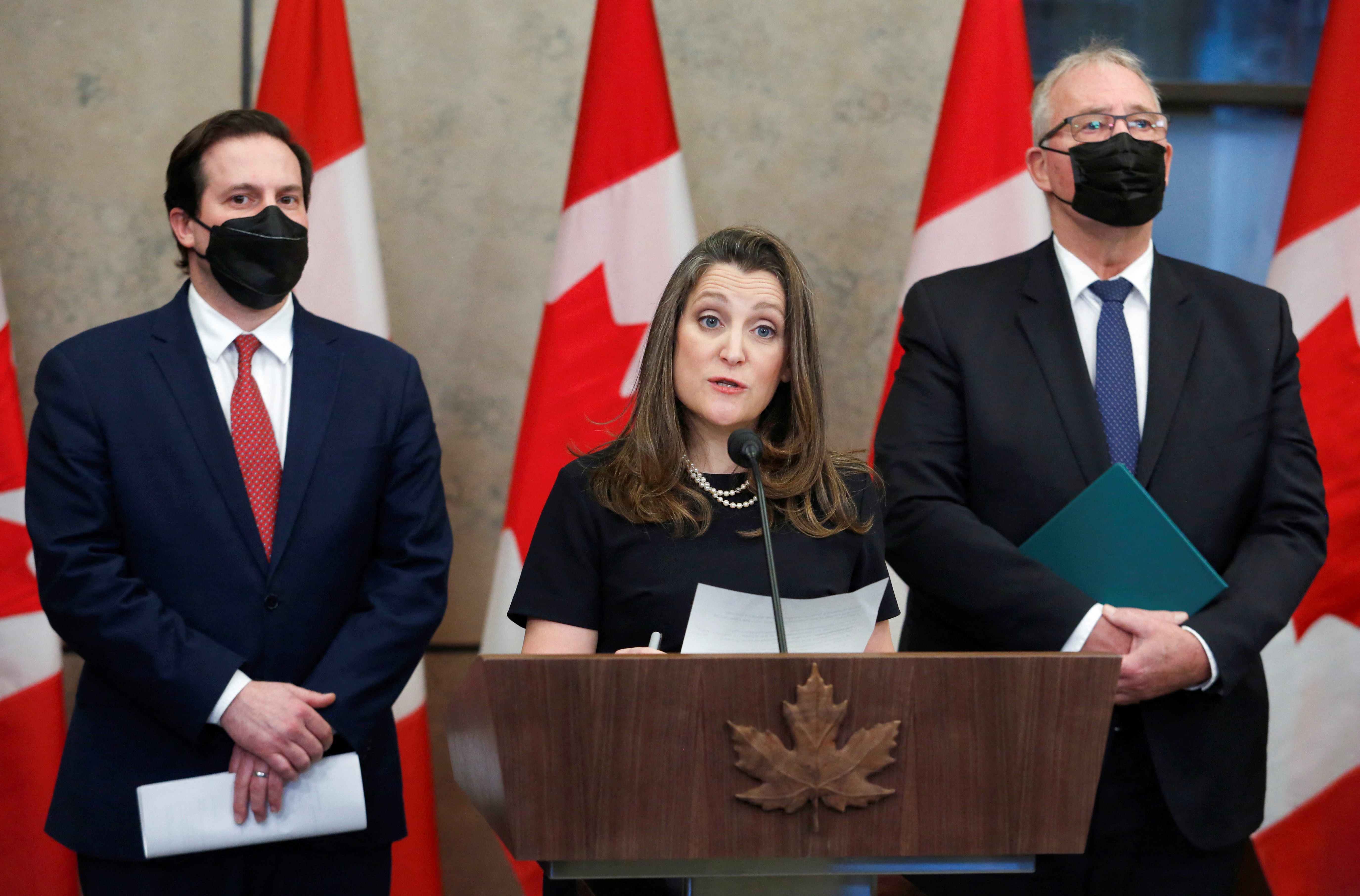 Canada’s Deputy Prime Minister and Minister of Finance Chrystia Freeland speaks at a press conference flanked by Minister of Public Safety Marco Mendicino (left) and Minister of Emergency Preparedness Bill Blair (right), as truckers and their supporters continue to protest against coronavirus disease vaccine mandates in Ottawa, Ontario, Canada