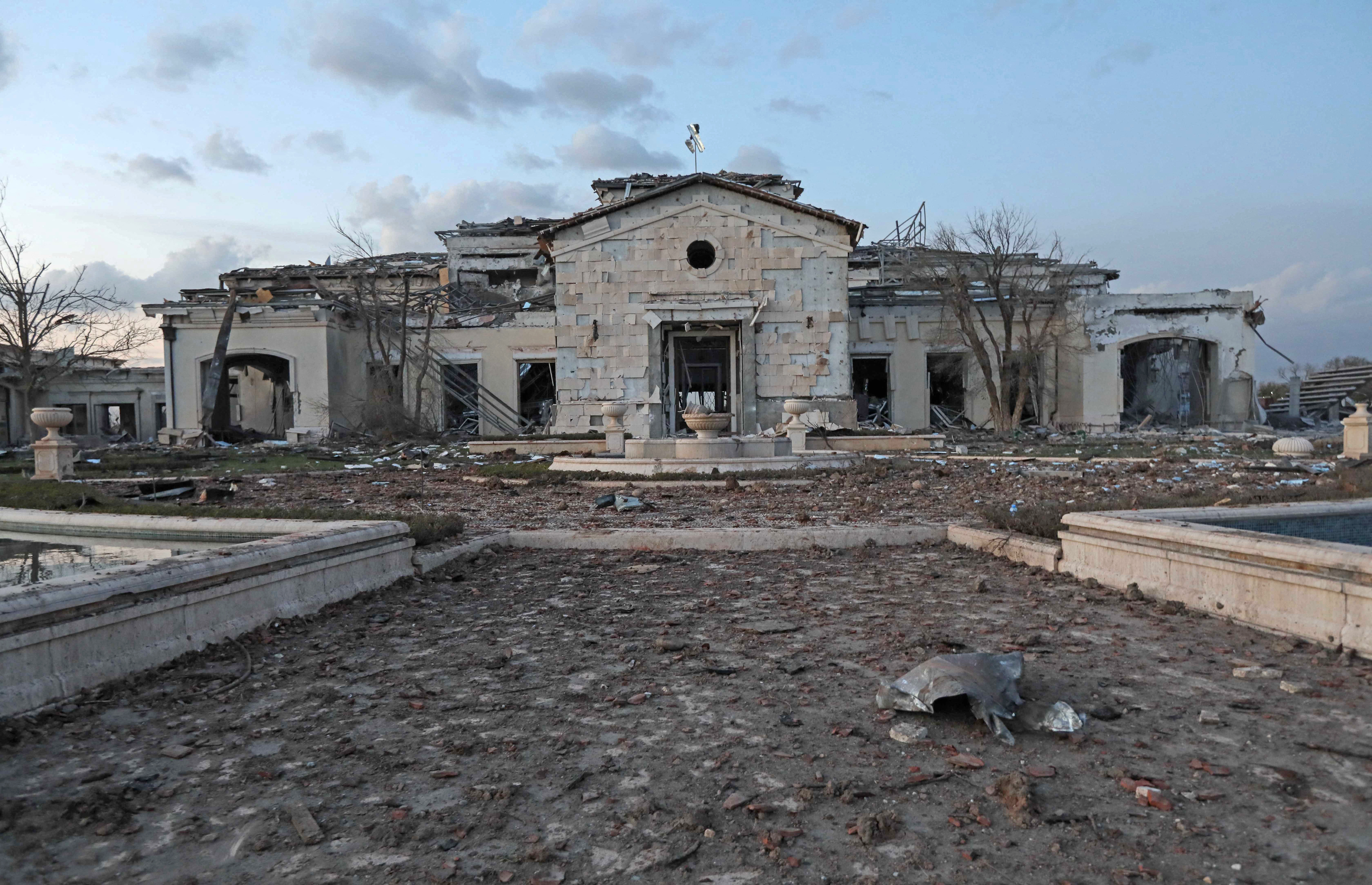 A general view shows a damaged mansion following an overnight attack in Arbil