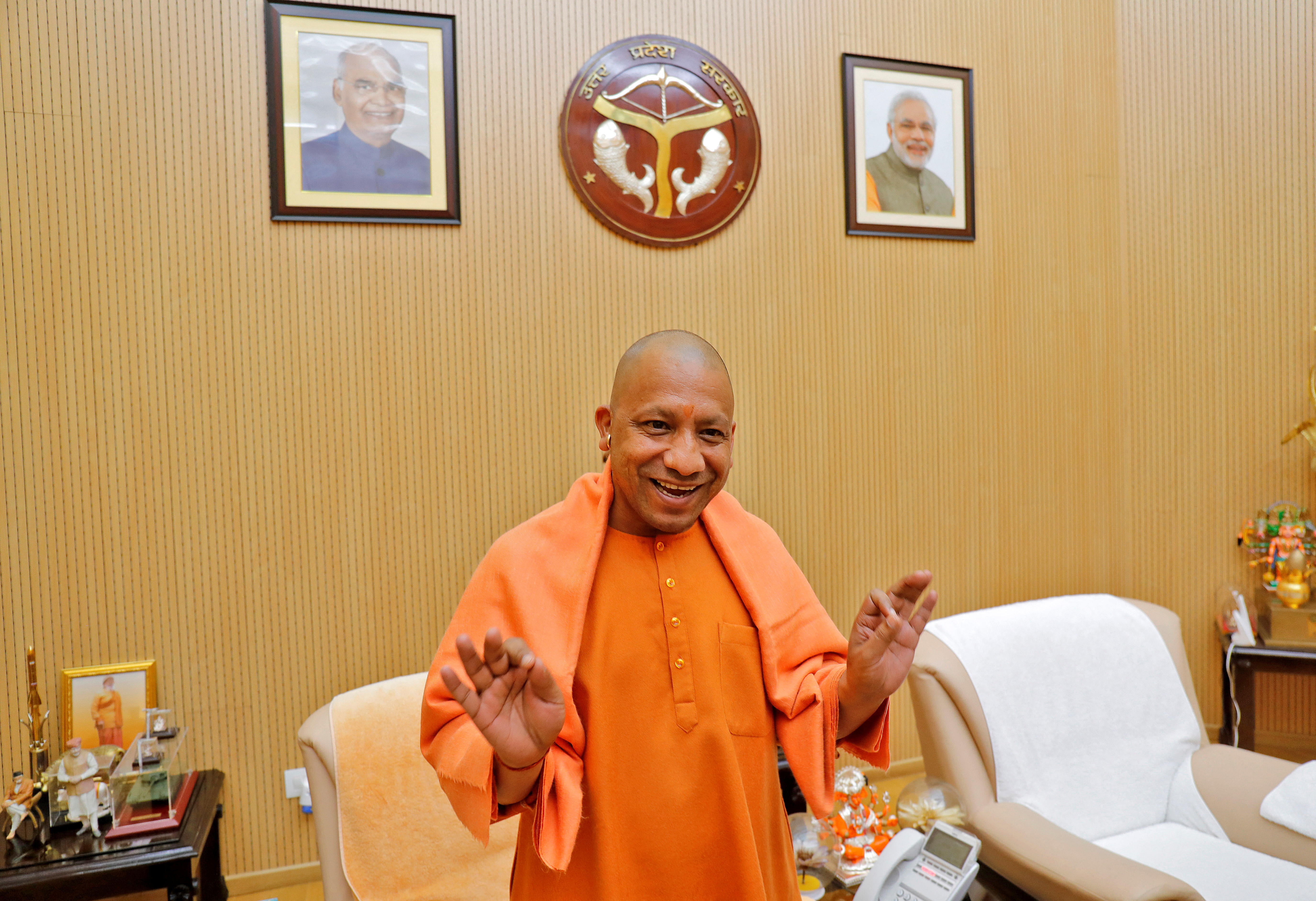 Adityanath reacts after an interview with Reuters at his official residence in Lucknow