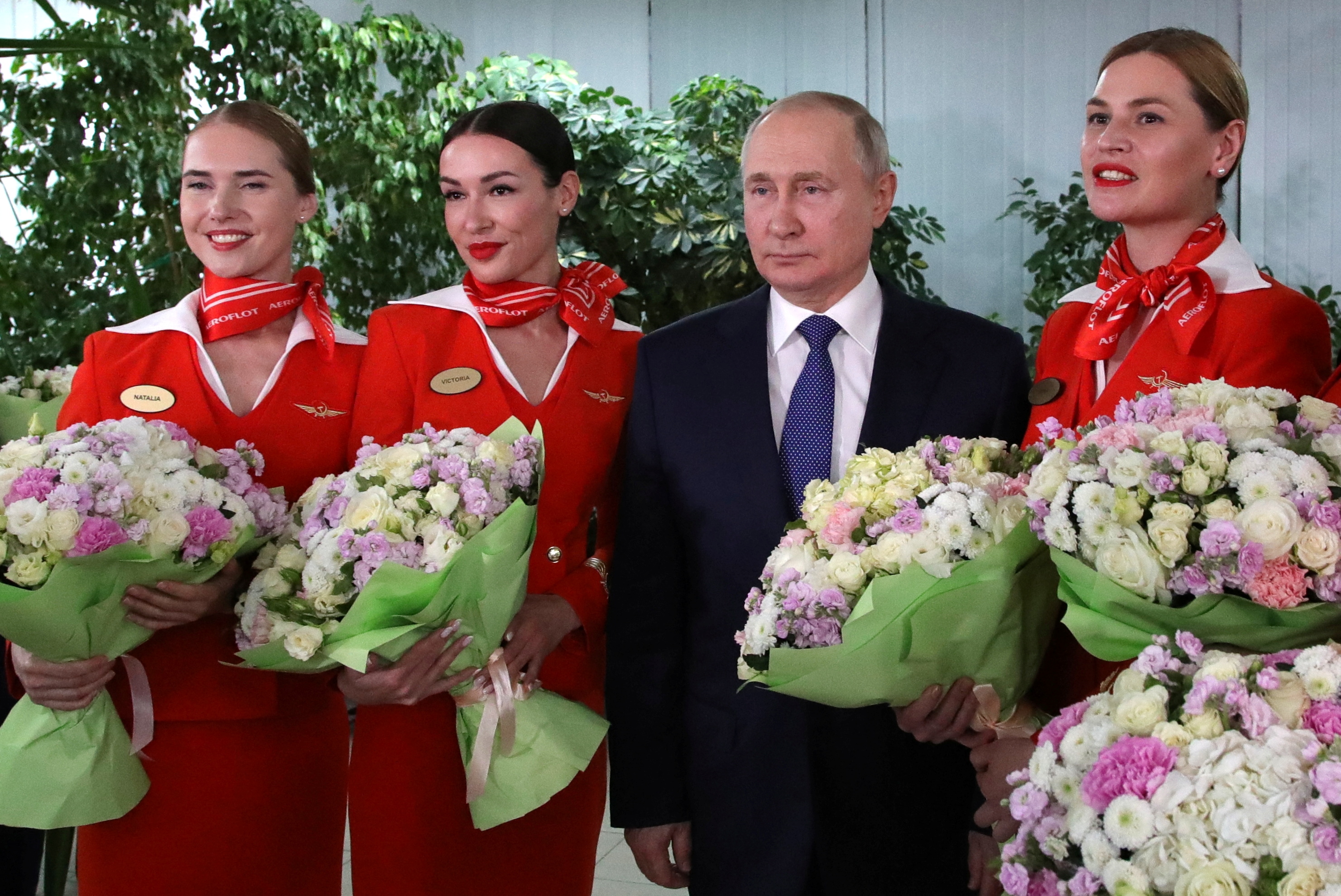 Russian President Vladimir Putin meets with flight personnel, students and employees of the Aeroflot Aviation School