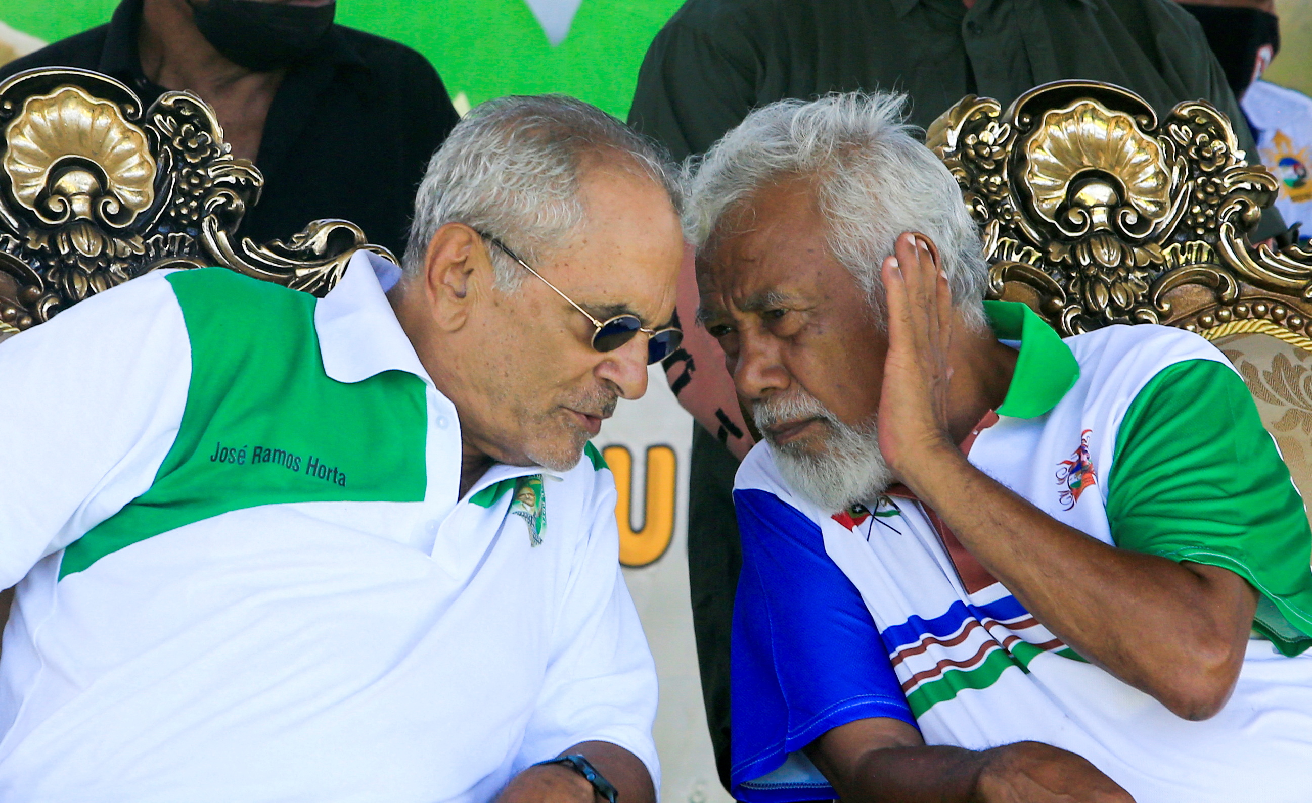 East Timor’s former leader and Nobel Peace Prize laureate Jose Ramos-Horta, who is a presidential candidate, talks to former President Xanana Gusmao during a campaign rally ahead of the country’s presidential election {Lirio da Fonseca/Reuters]