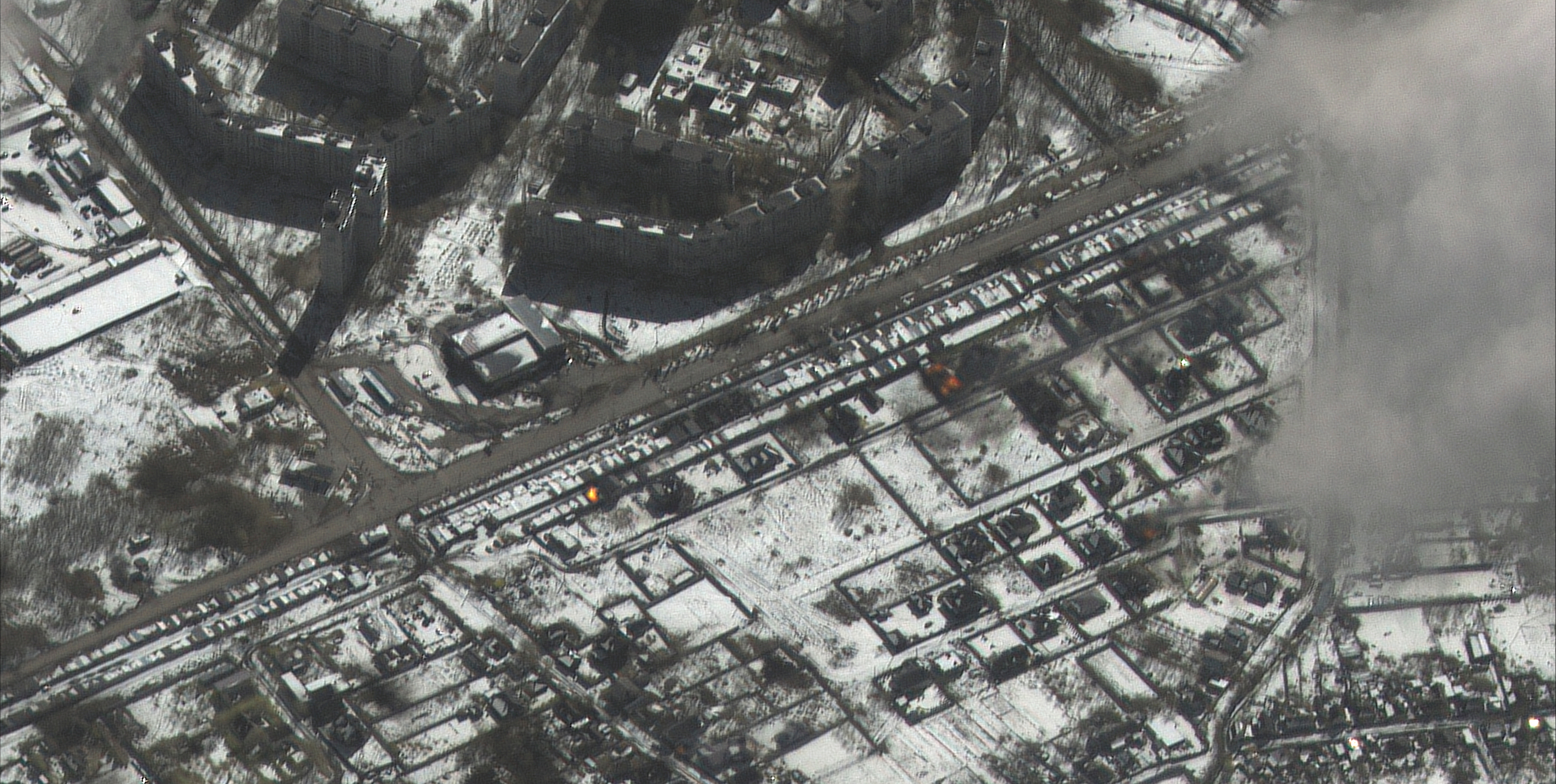 A satellite image shows fires and damage in a residential area, in Kharkiv, Ukraine, March 16, 2022.