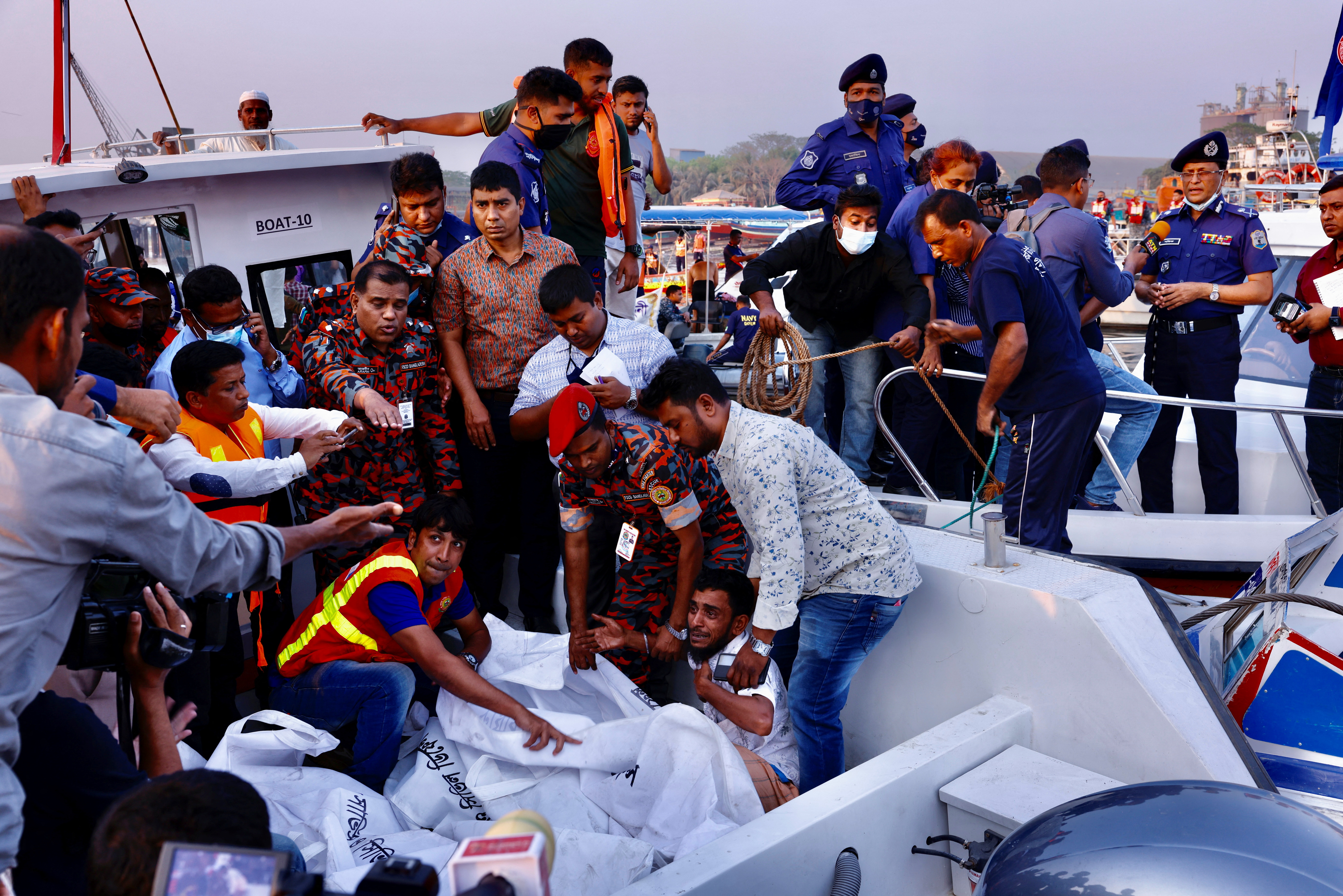 A relative of one of the victims mourns as a ferry sank
