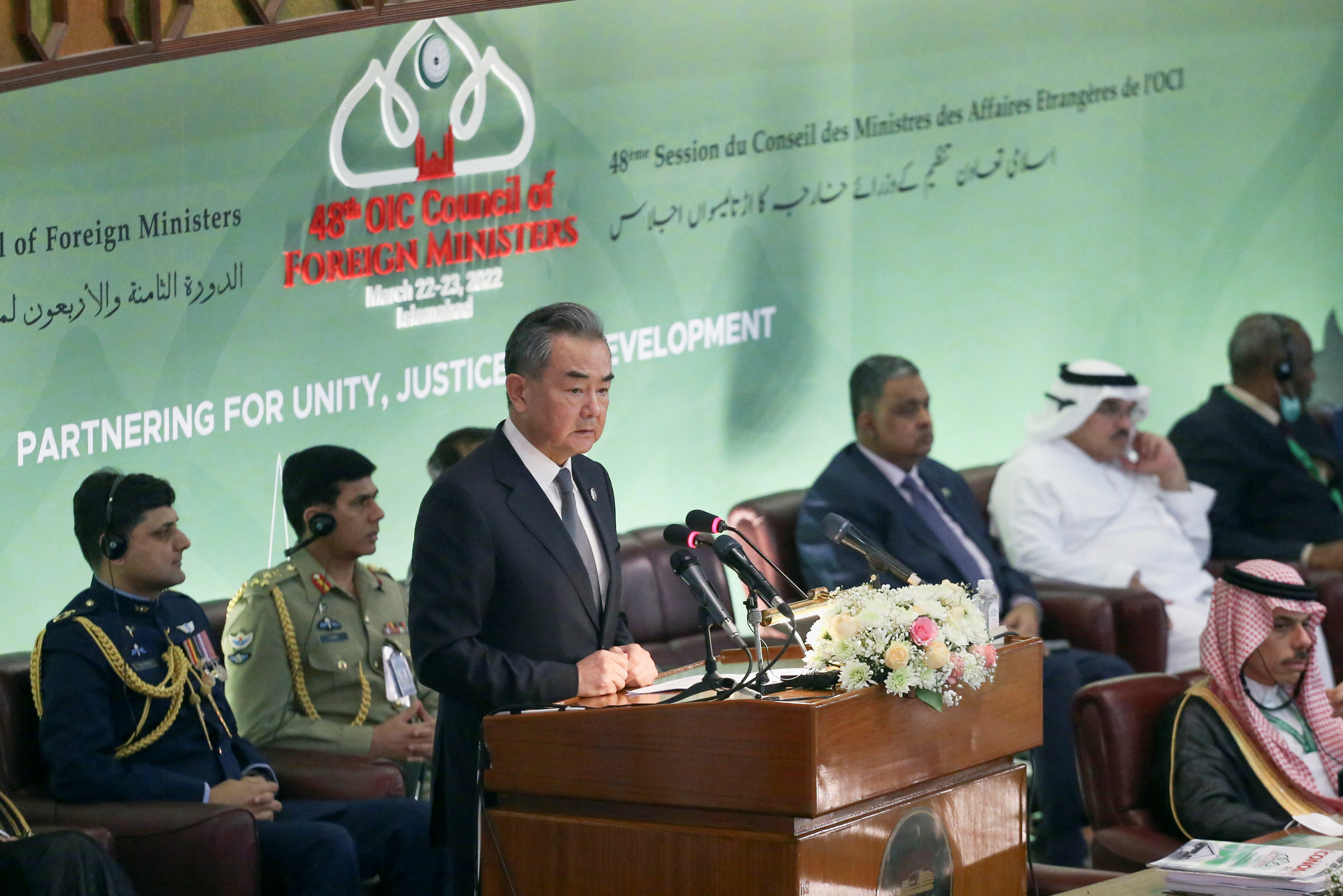 Wang Yi addressing the 48th meeting of the Organisation of Islamic Cooperation (OIC) Council of Foreign Ministers in Islamabad on March 22, 2022