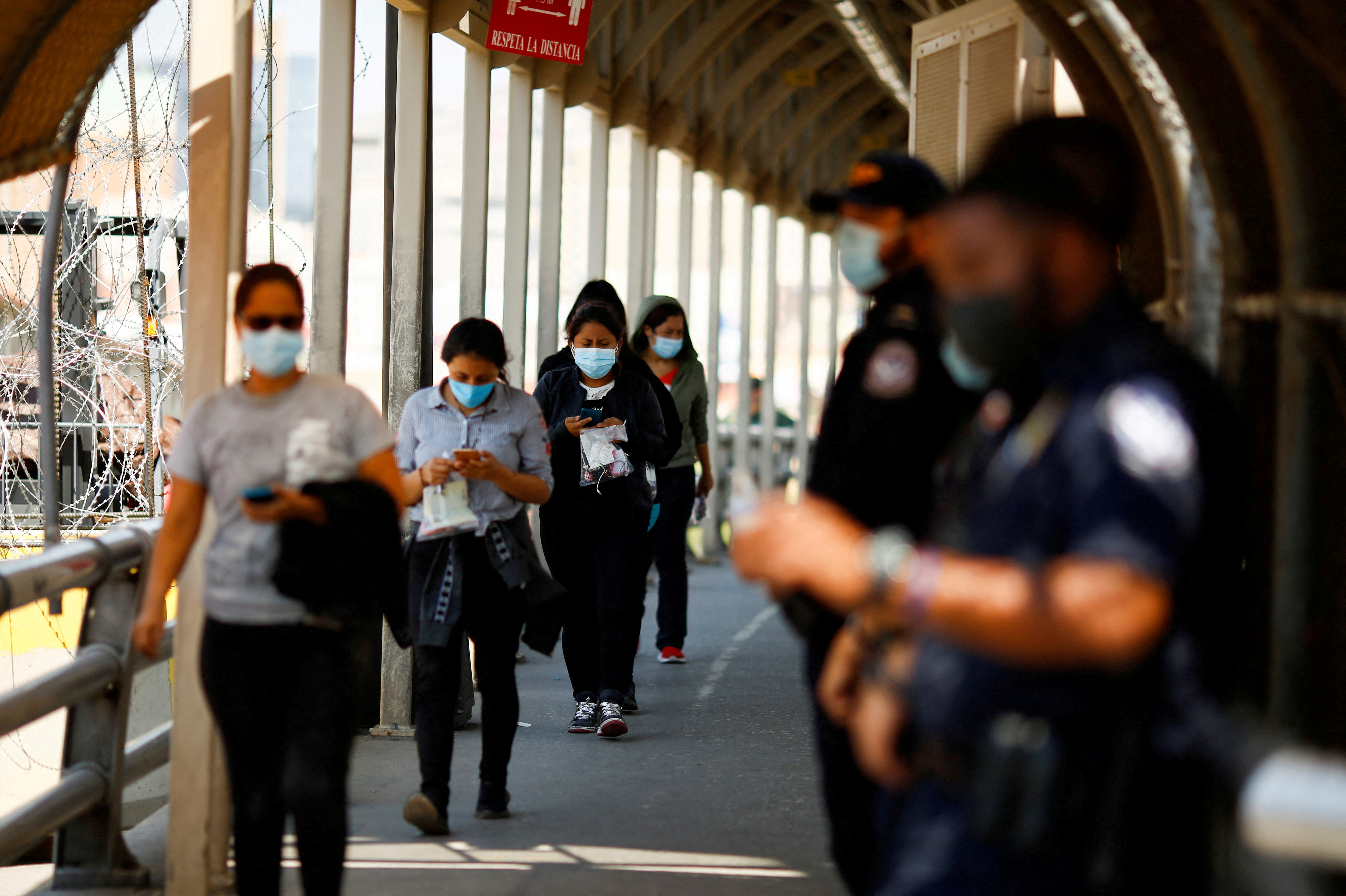 Migrants walking back to Mexico