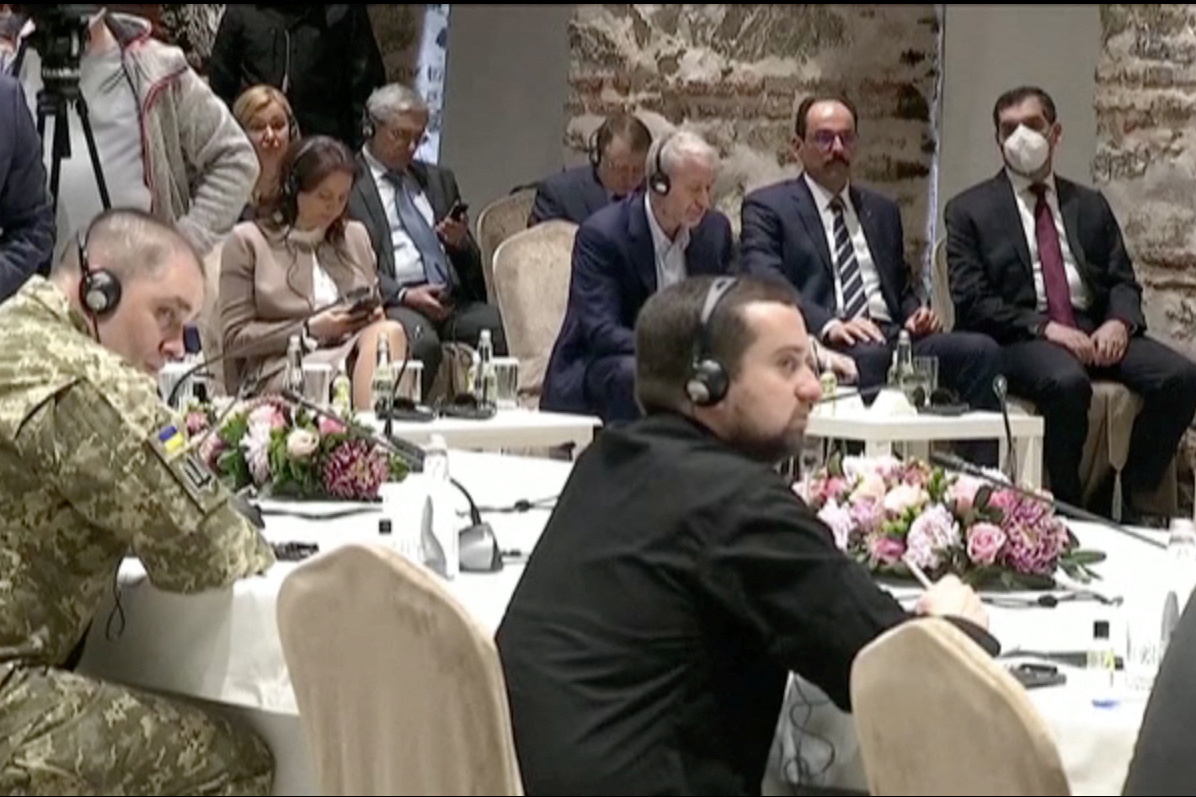 Russian billionaire Roman Abramovich, third from right, listens as Turkish President Erdogan addresses Russian and Ukrainian negotiators before their face-to-face talks [Screengrab: Turkish Presidency via Reuters TV]