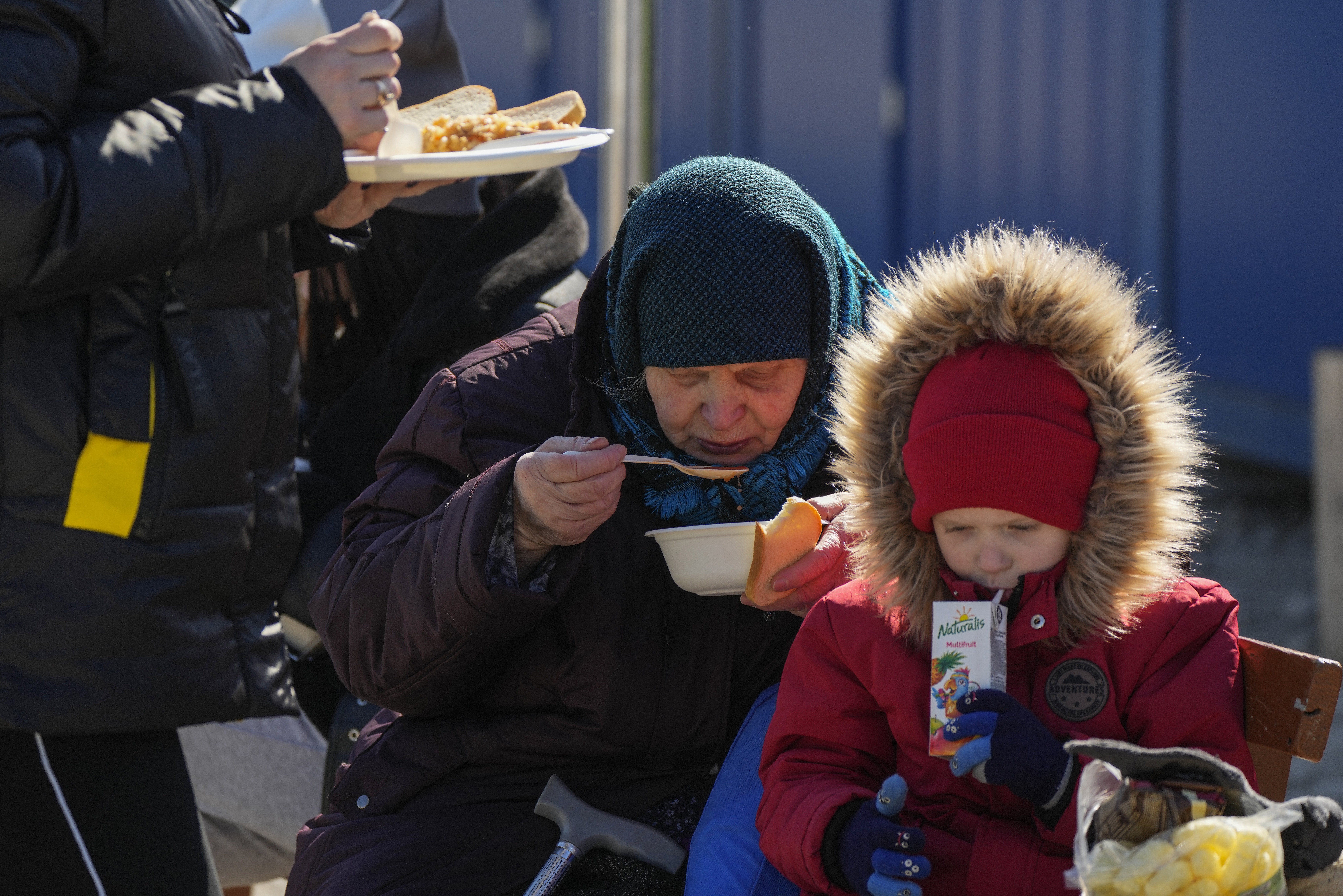 Refugees from the Ukrainian city of Mykolaiv at the border crossing in Palanca, Moldova