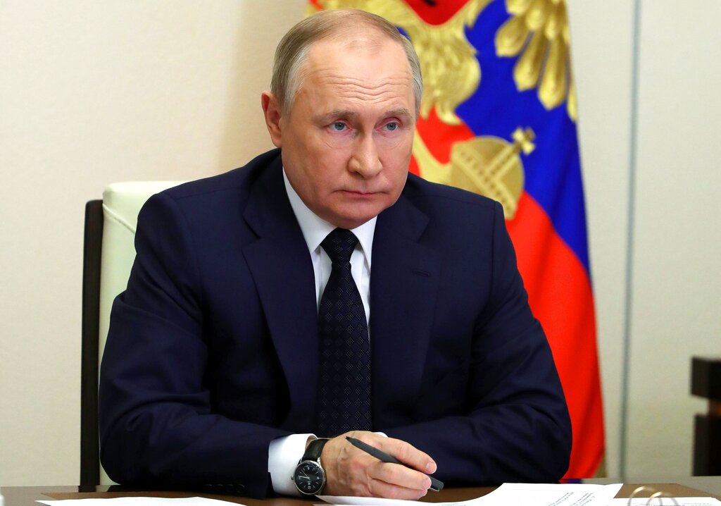 Russian President Vladimir Putin attends a cabinet meeting via videoconference at the Novo-Ogaryovo residence outside Moscow, Russia.