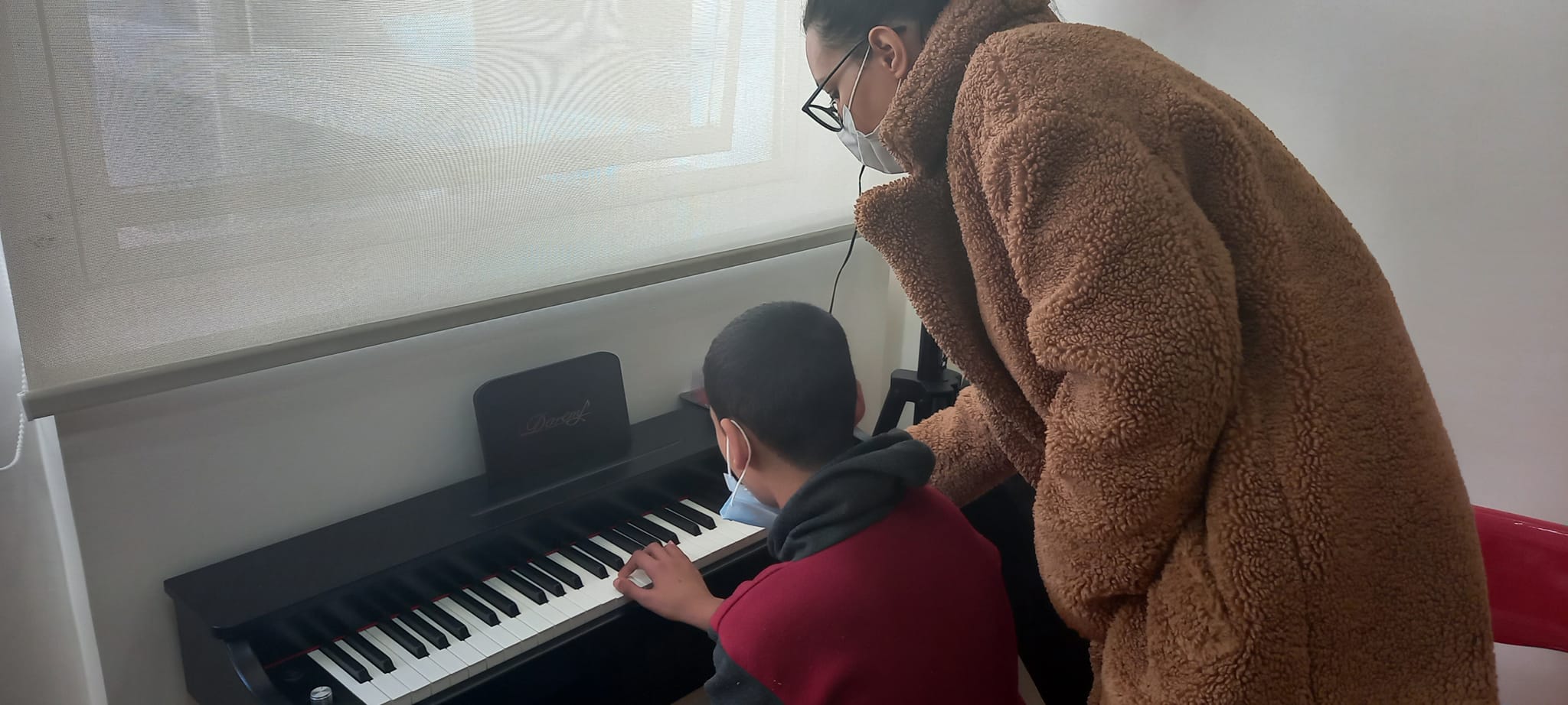 Music helps soothe patients, says piano teacher Sara Zouhair [Courtesy: Fennich Foundation]