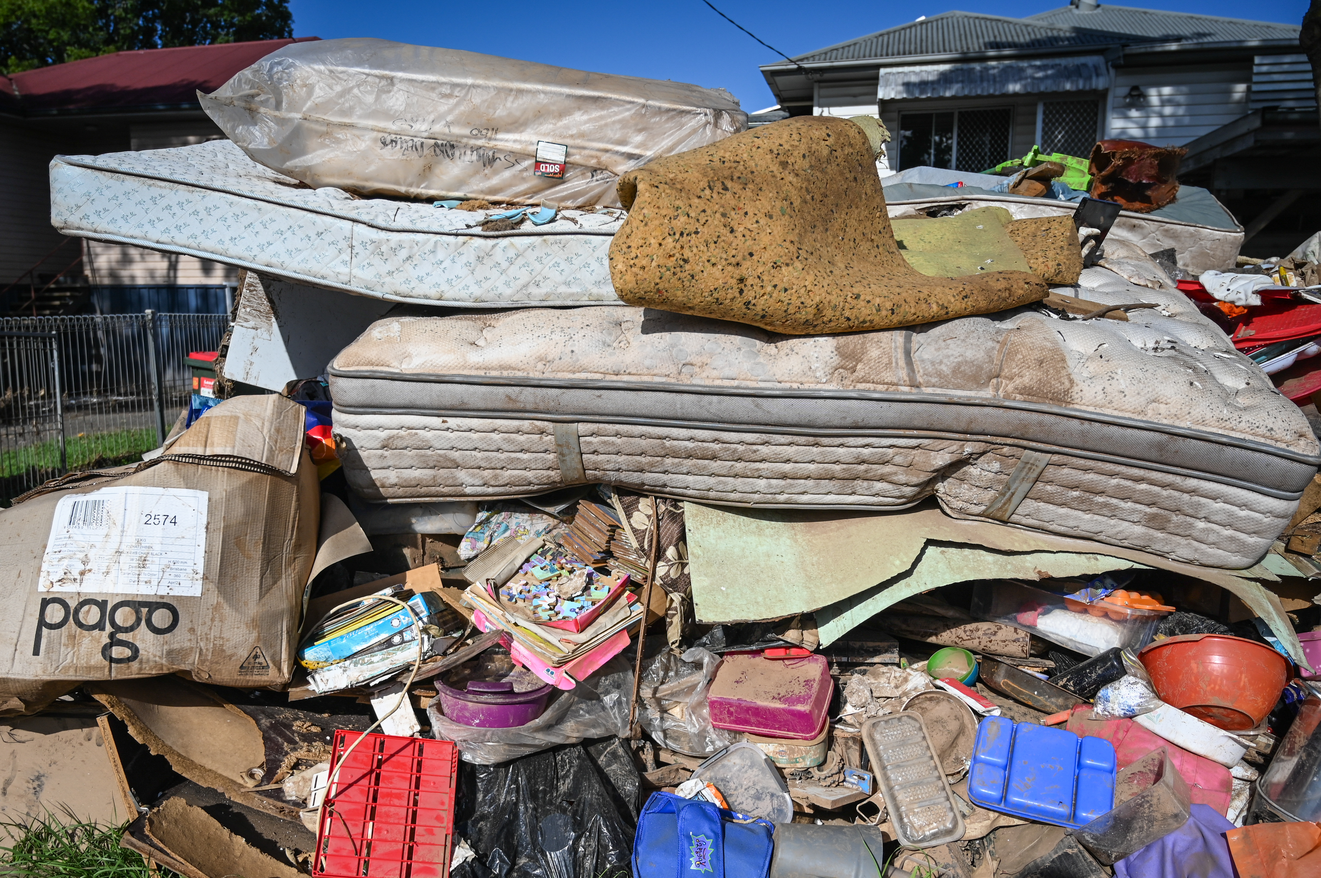 Residents left the ruined contents of their houses on the roadside as they tried to clean up after February’s floods
