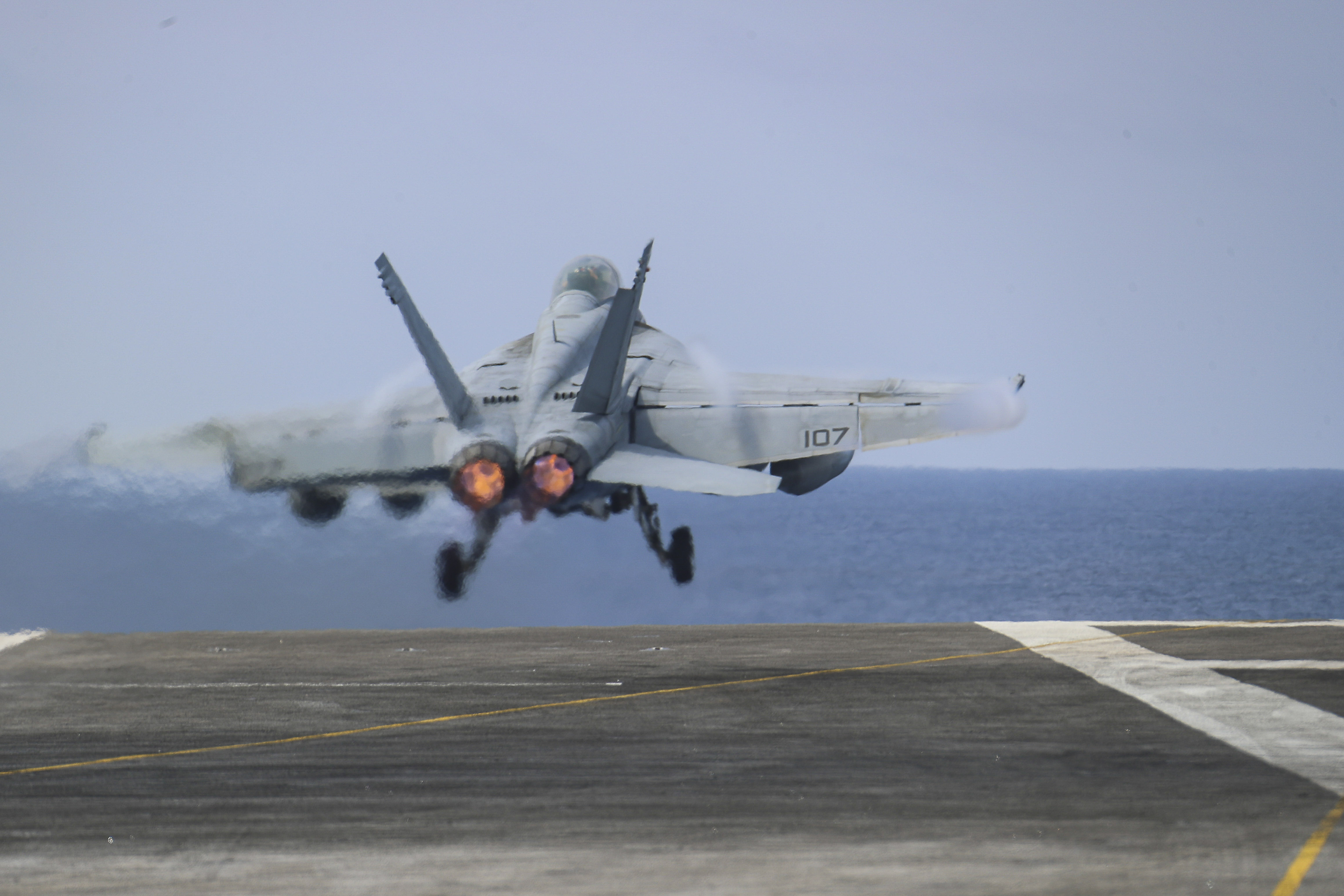 A F/A-18F Super Hornet takes off from the flight deck of the Nimitz-class aircraft carrier USS Abraham Lincoln during long-range exercises conducted in the Yellow Sea this week