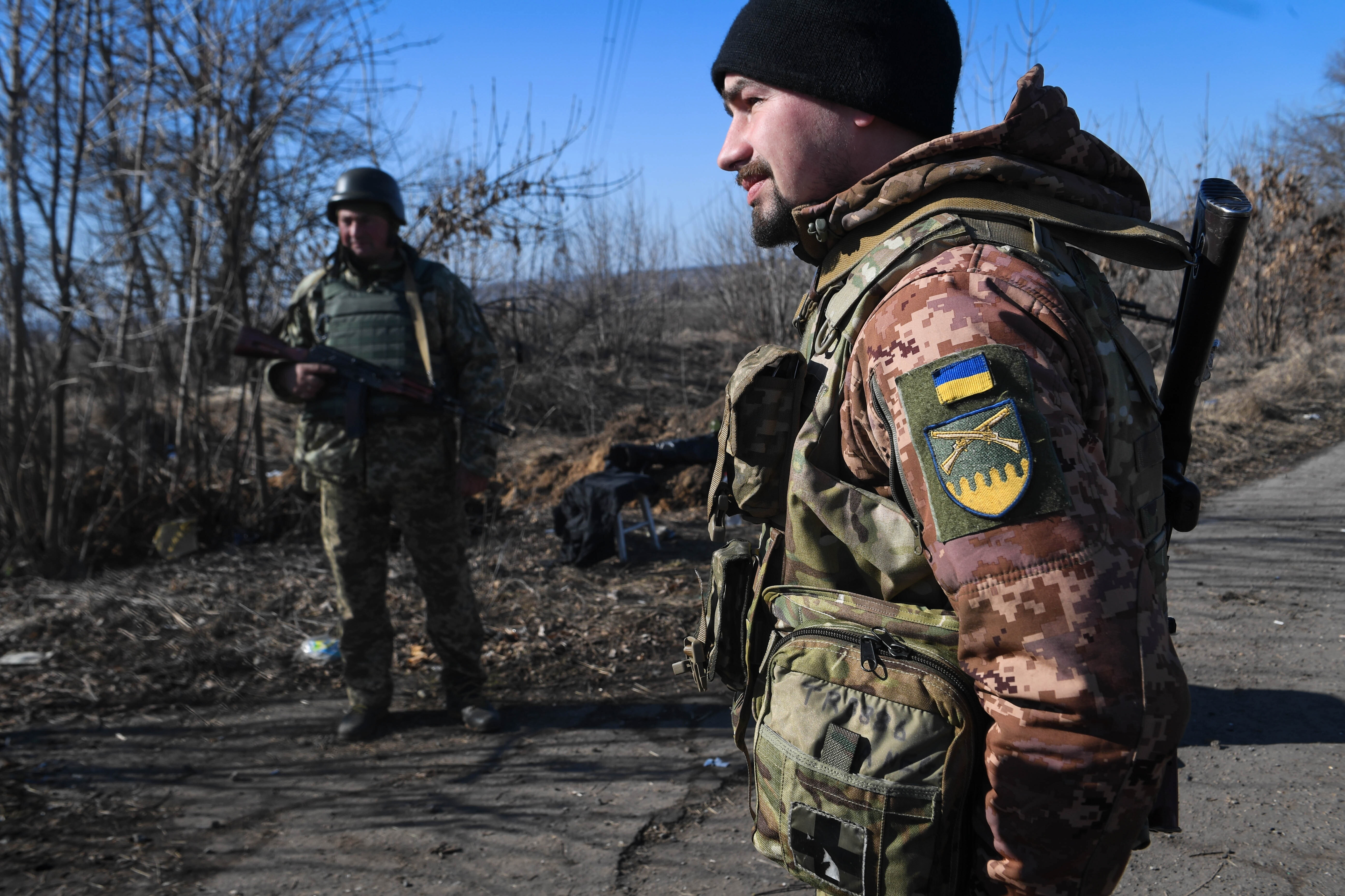 Ukrainian soldiers on the road outside Kharkiv, Ukraine.