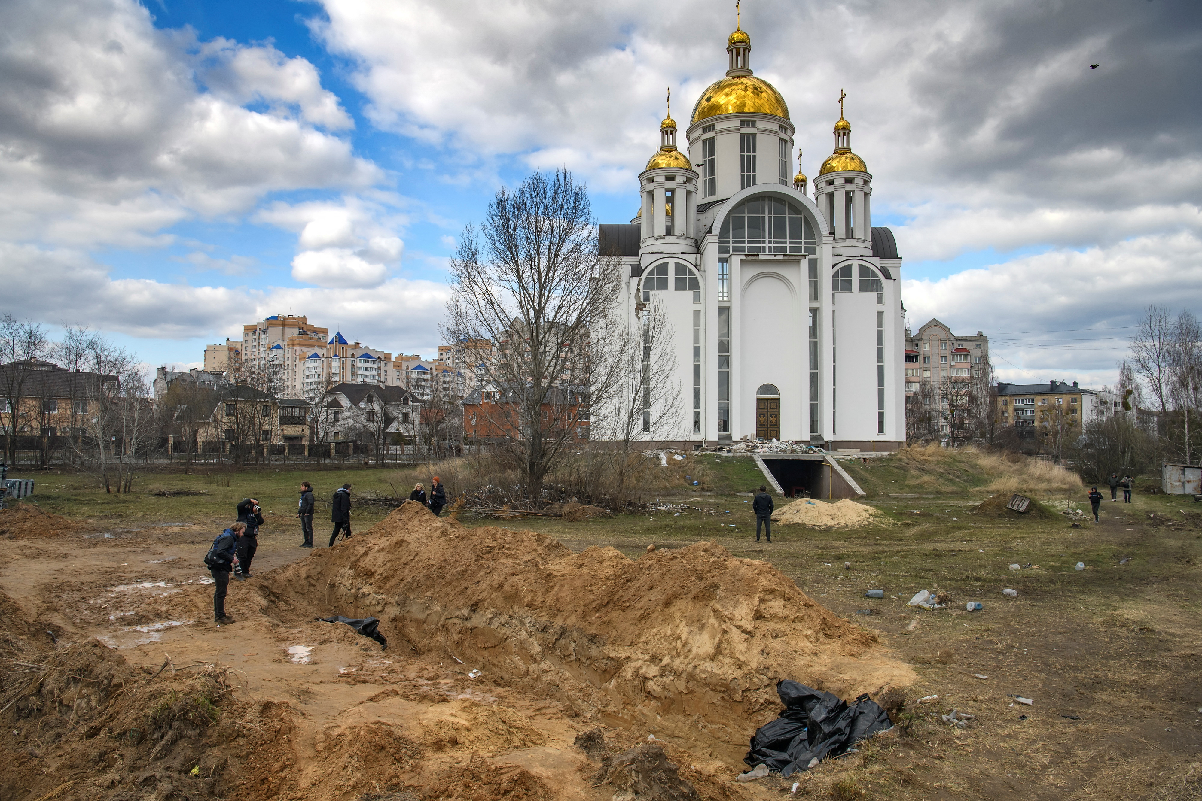 Mass graves were uncovered in Bucha following Russian troops’ withdrawal from the town as they pulled back from positions in northern Ukraine