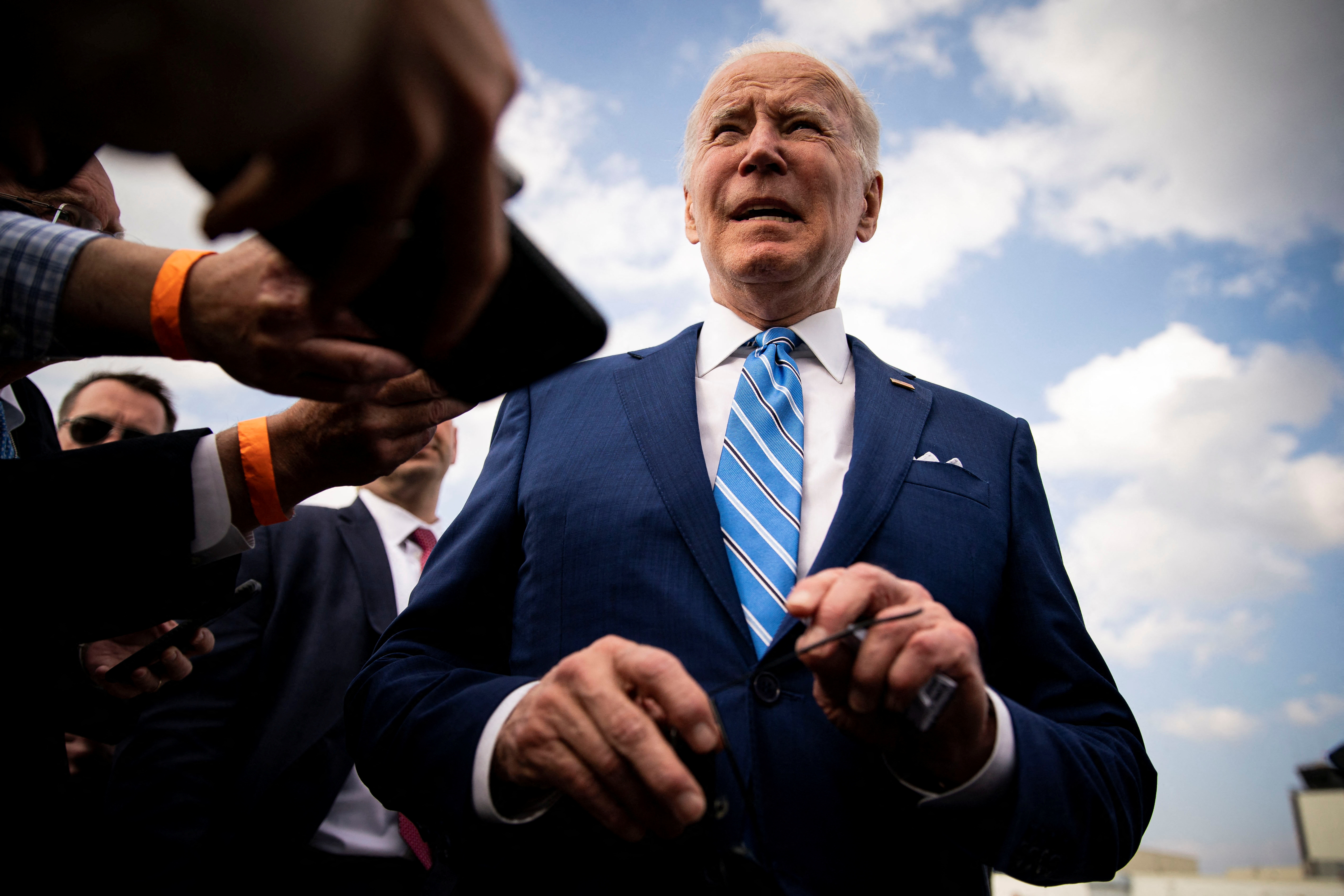 Biden spoke to reporters while departing Des Moines International Airport in Iowa