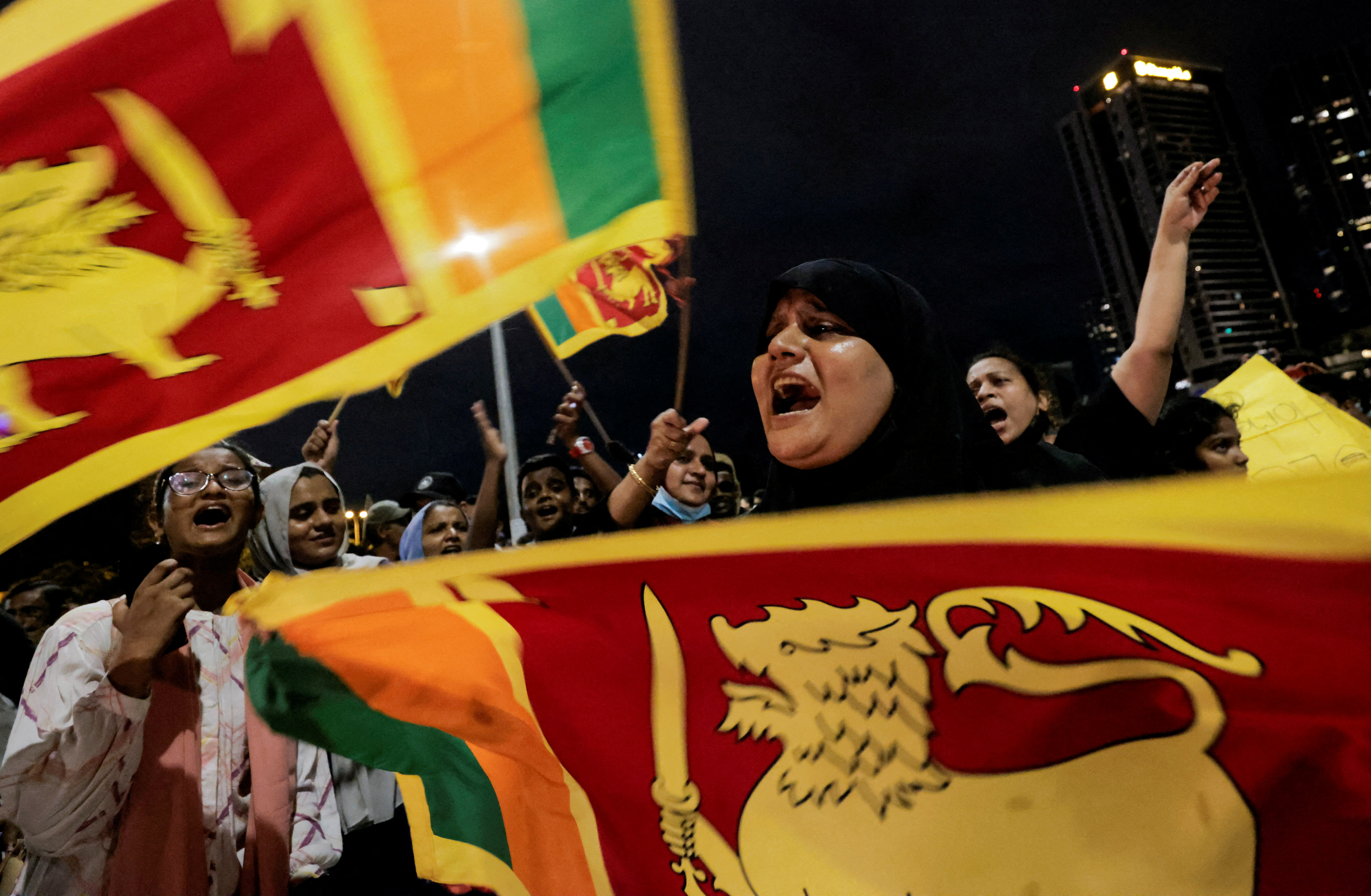 Protesters shout slogans against Sri Lankan President Gotabaya Rajapaksa near the Presidential Secretariat in Colombo, Sri Lanka