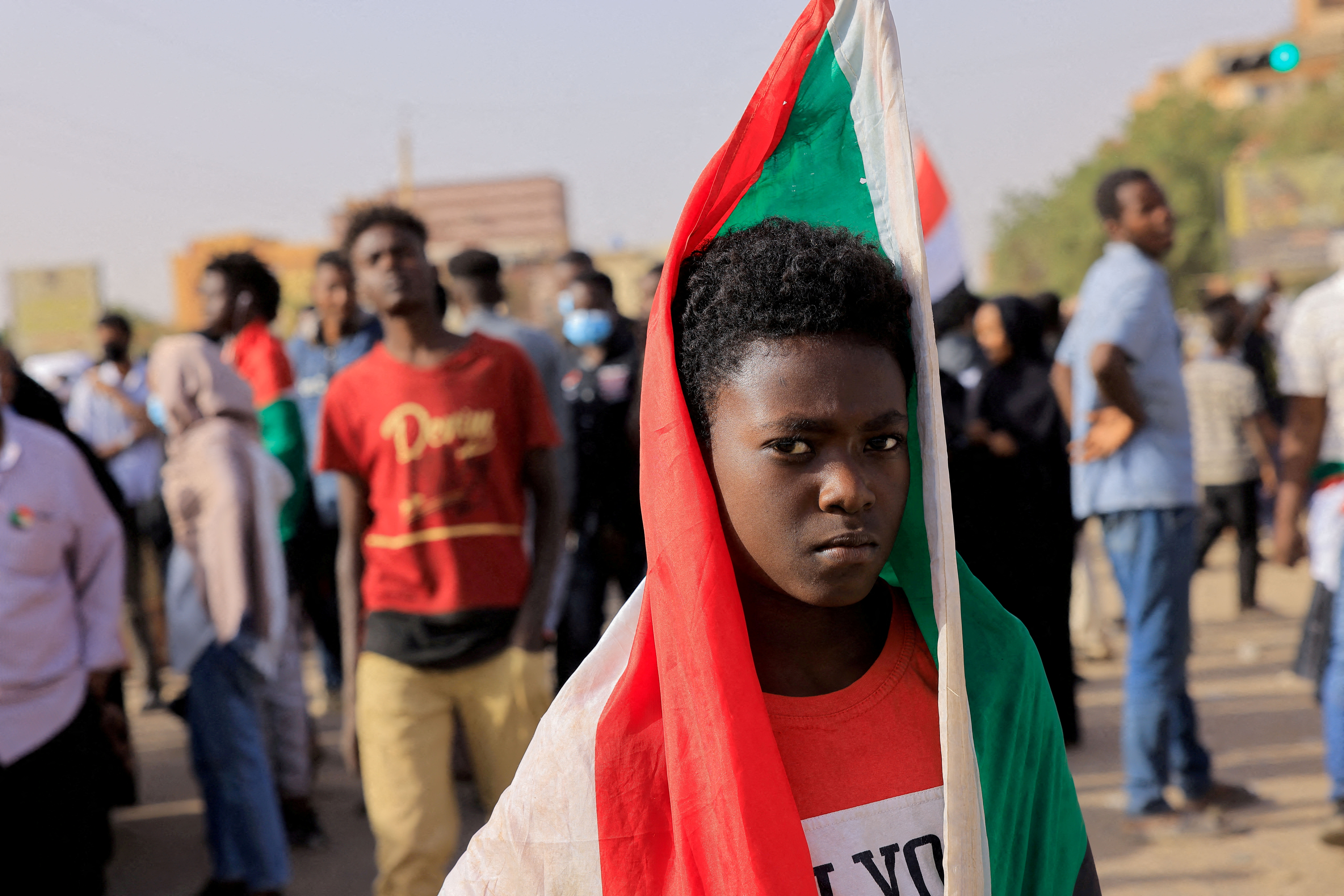 A protester marches during a rally