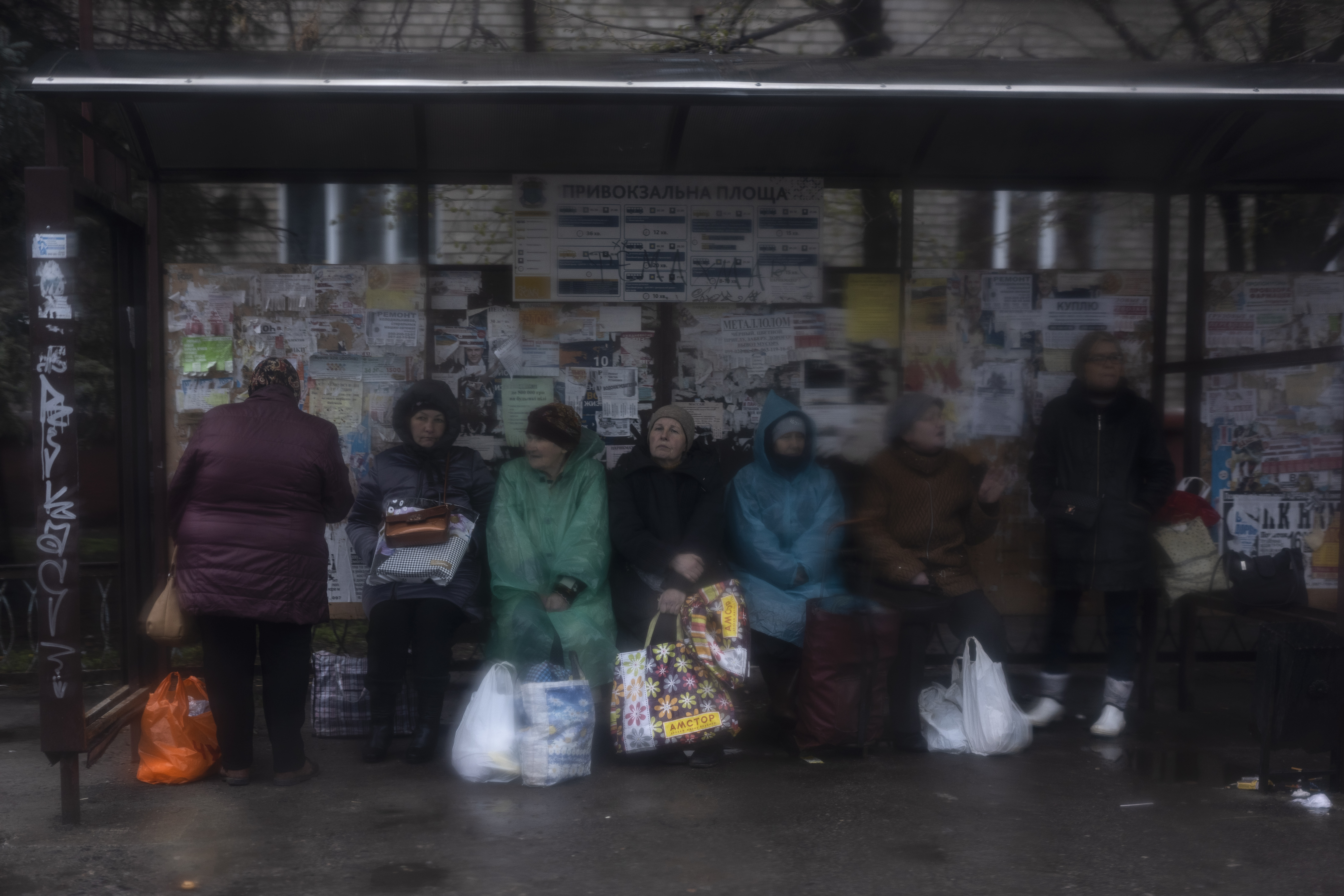 Women waiting at a bus station in Kramatorsk, Ukraine