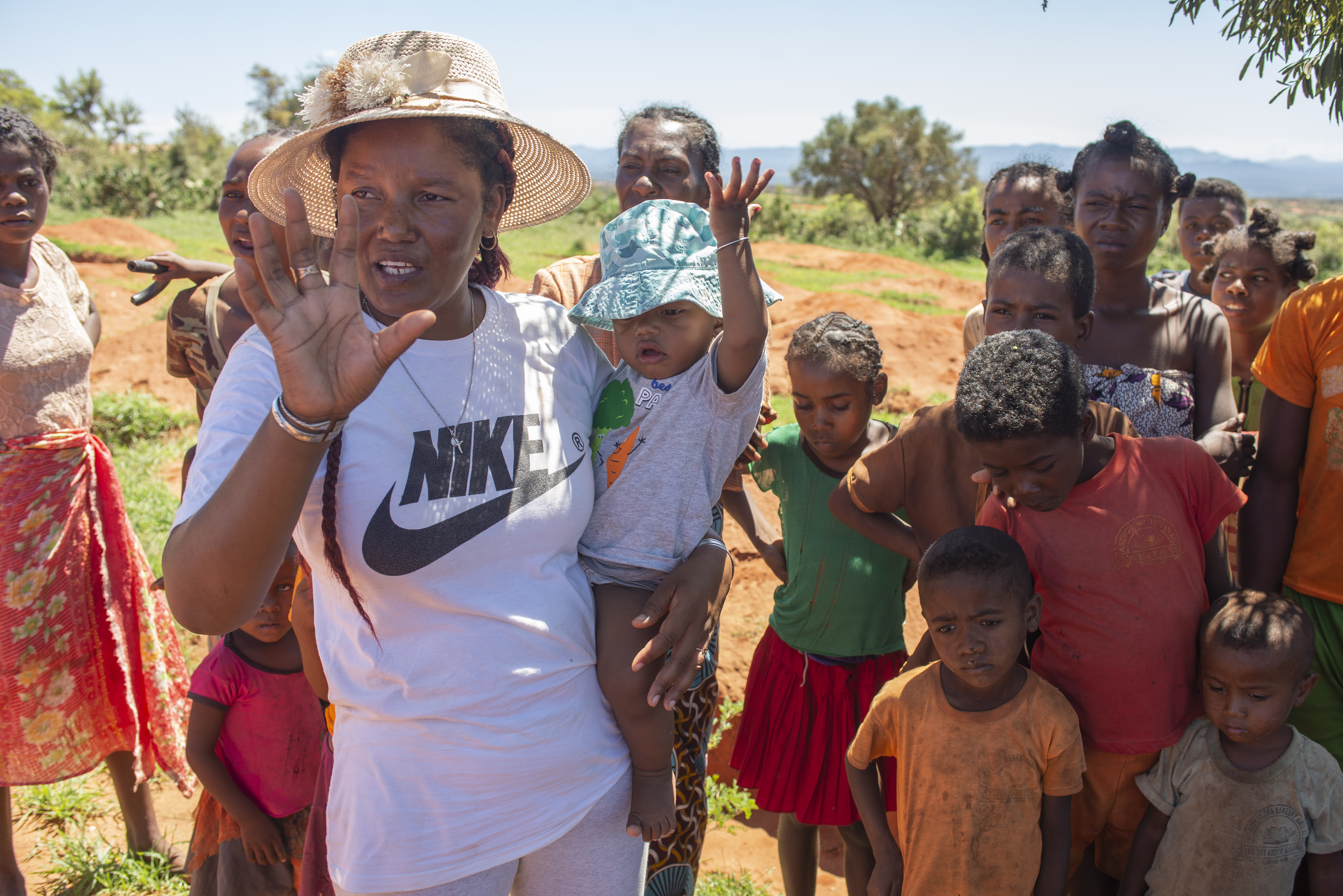 Sailambo instructs villagers on how best to manage a project to prevent desertification in Erada Beagnatara village. She says she wants to inspire more women to take leadership roles. [Joseph Stepansky/Al Jazeera]