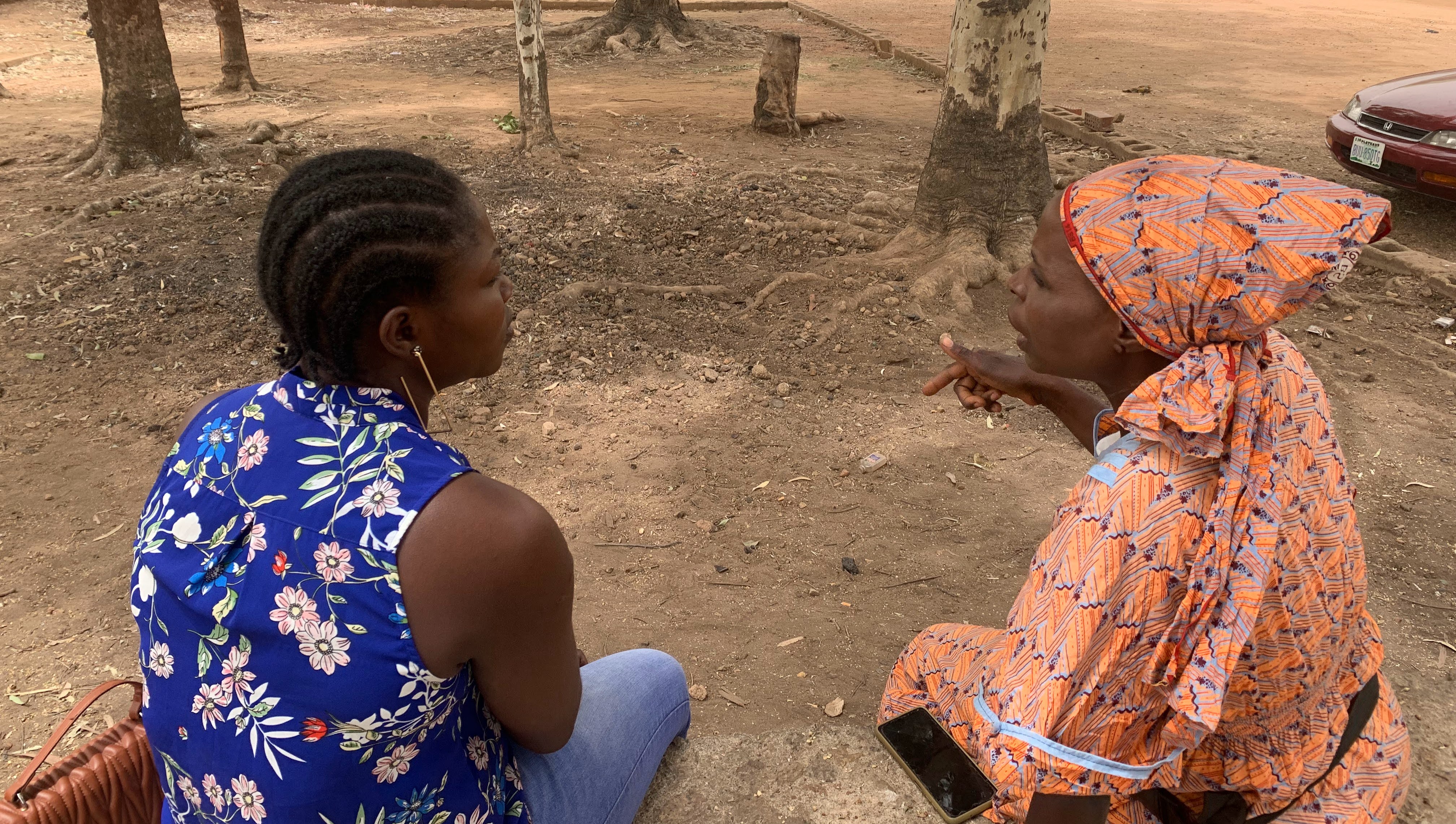 Nandang in conversation with Titi, right, recounting Titi’s efforts to break away from her abusive marriage