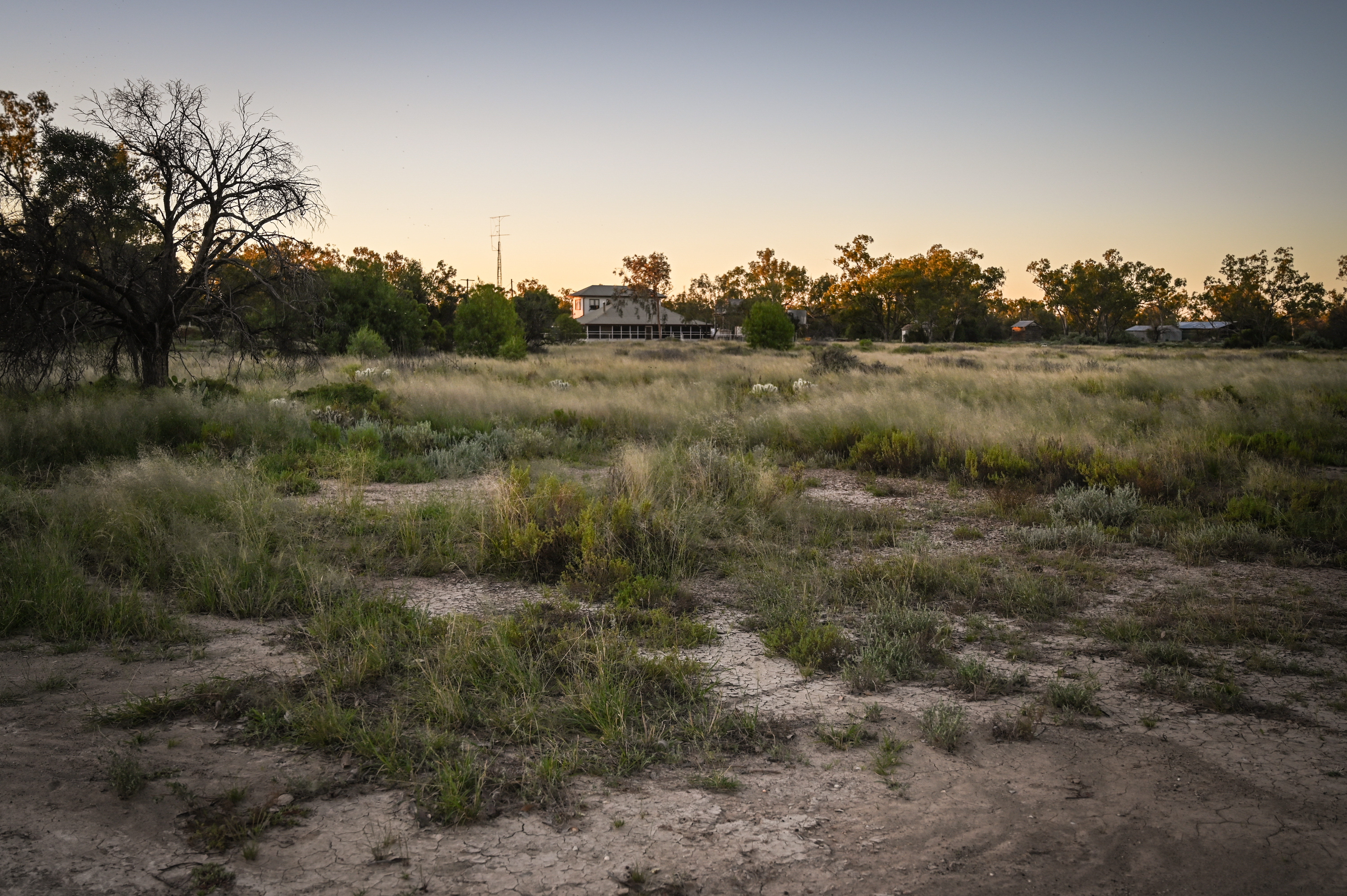 A photo of a house in the distance.