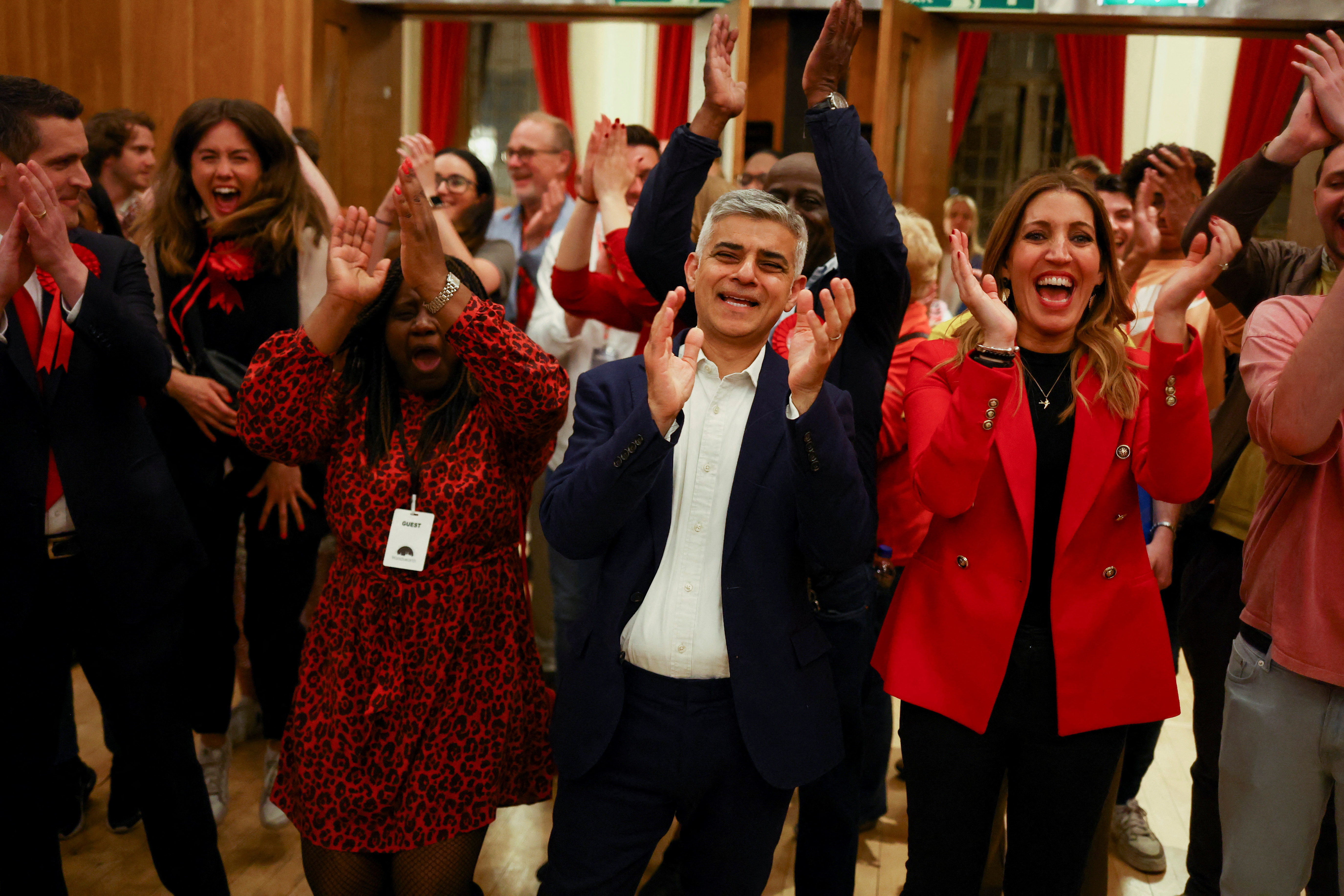London Mayor Sadiq Khan claps and smiles alongside MP Dr Rosena Allin-Khan in Wandsworth