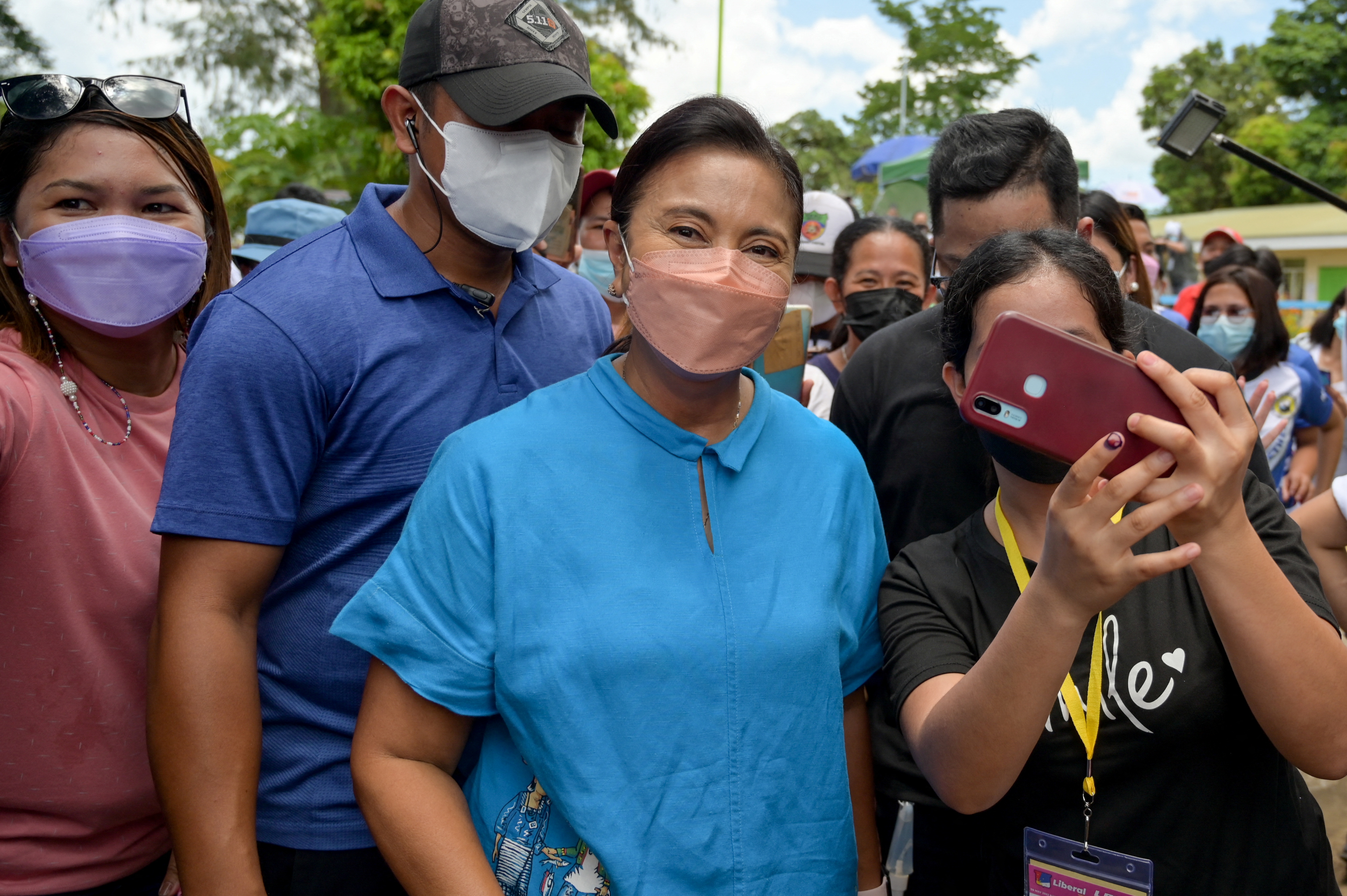 Philippine Vice President and presidential candidate Leni Robredo prepares to leave the precinct after casting her vote, in Magarao, Camarines Sur, Philippinnes,
