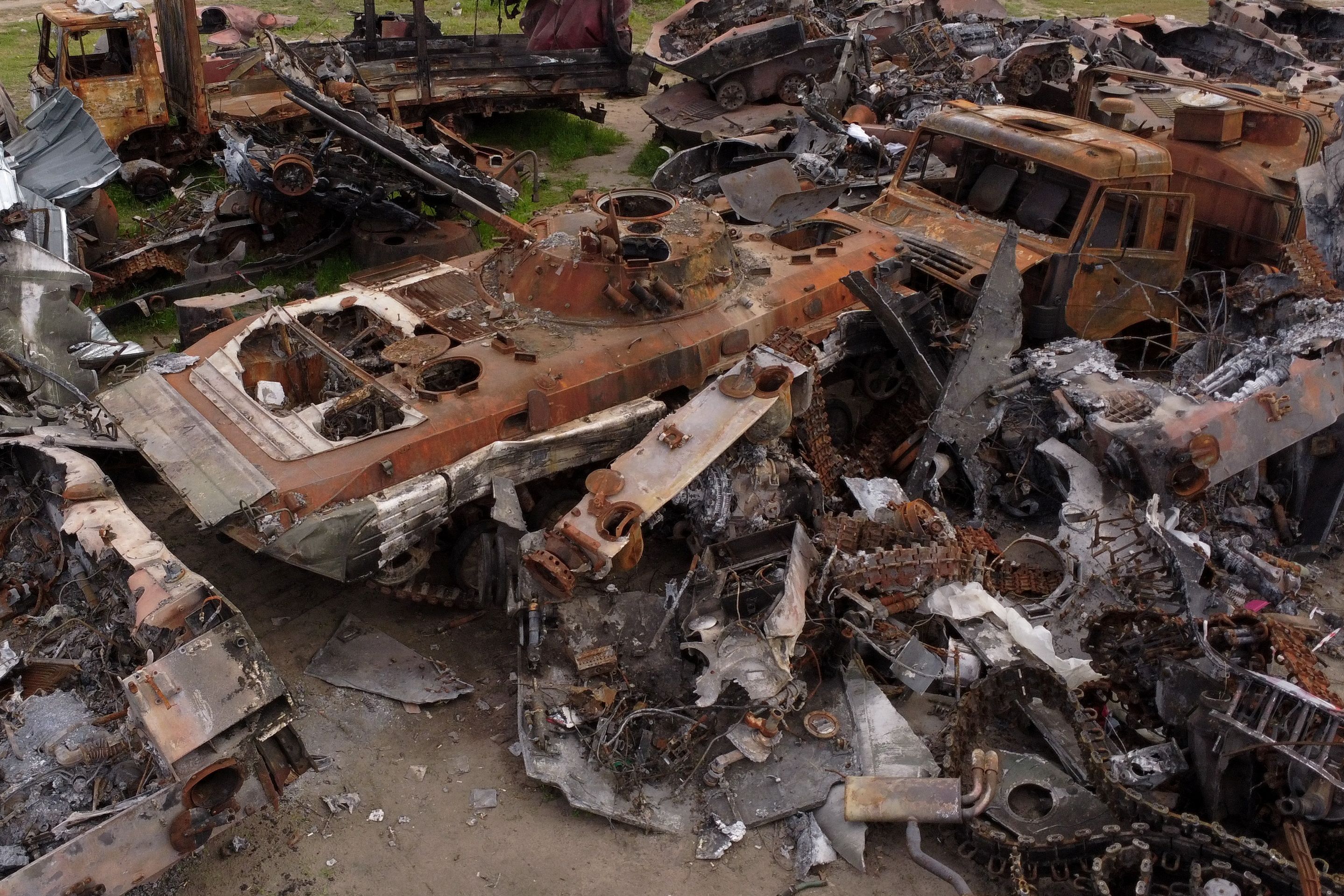 Destroyed Russian tanks and military vehicles are seen dumped in Bucha amid Russia’s invasion of Ukraine