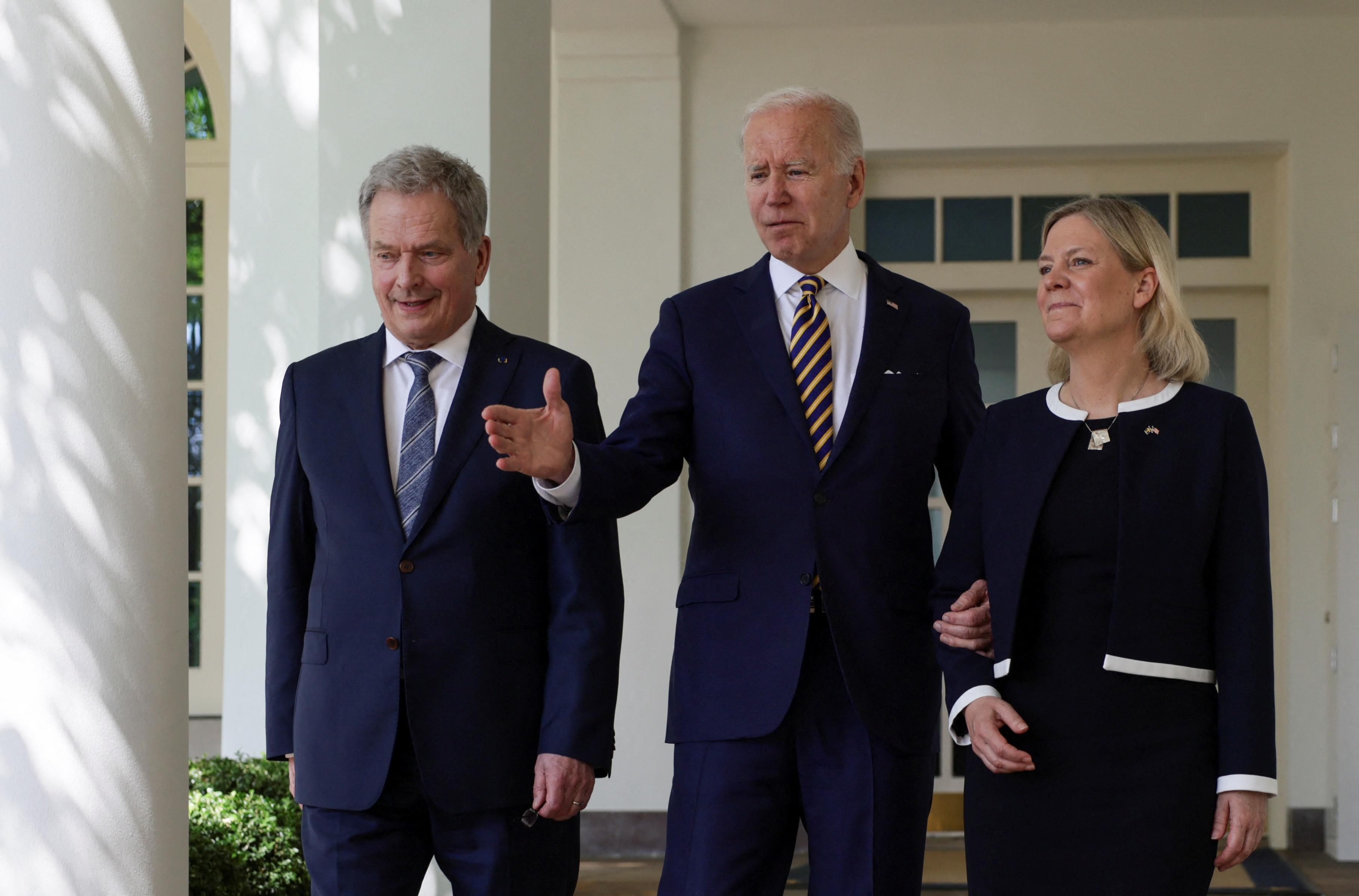 US President Joe Biden walks with Sweden’s Prime Minister Magdalena Andersson and Finland’s President Sauli Niinisto to deliver remarks in the Rose Garden of the White House in Washington, DC, US, May 19, 2022