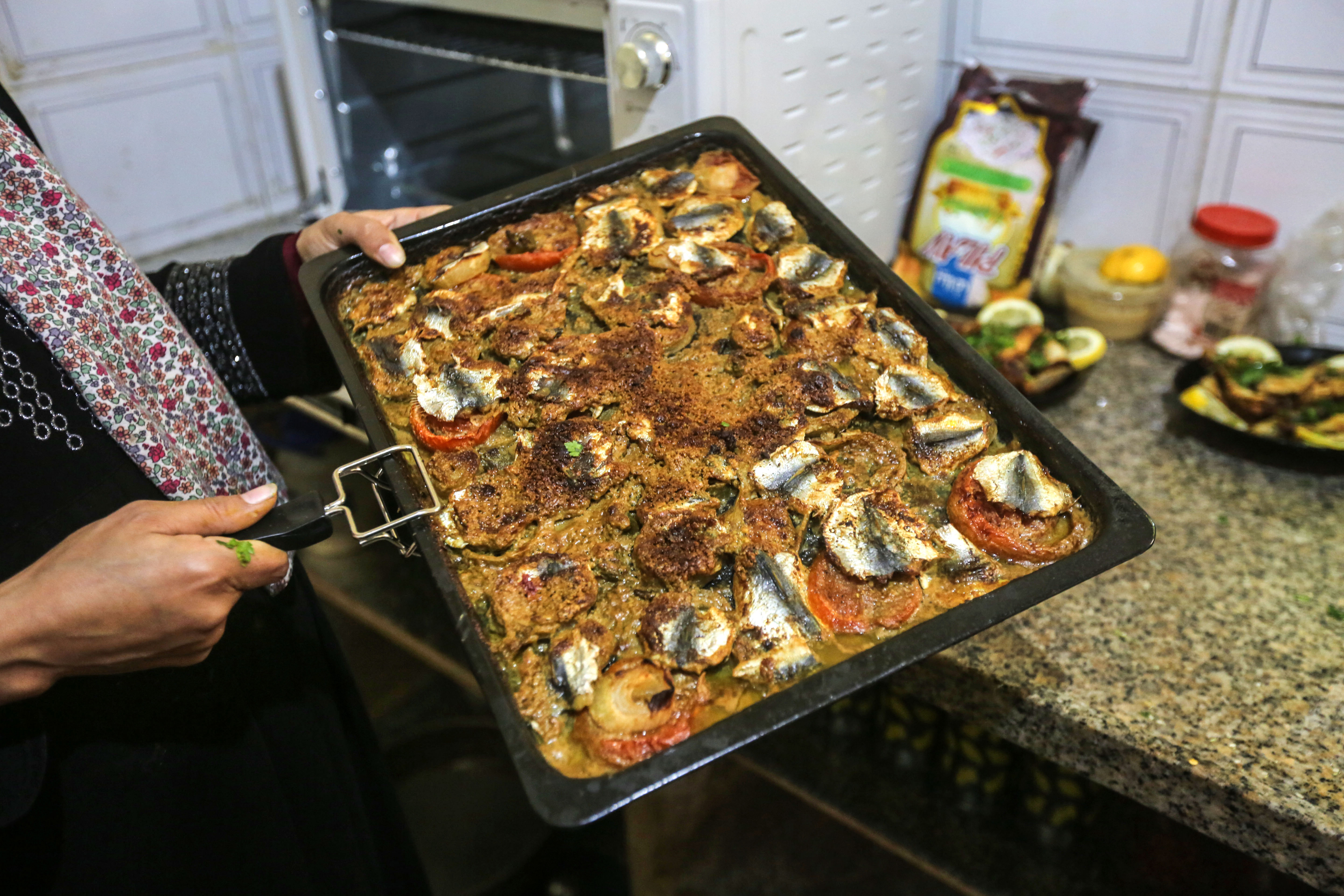 The tahini-baked sardines come out a little crisp, and a lot fragrant