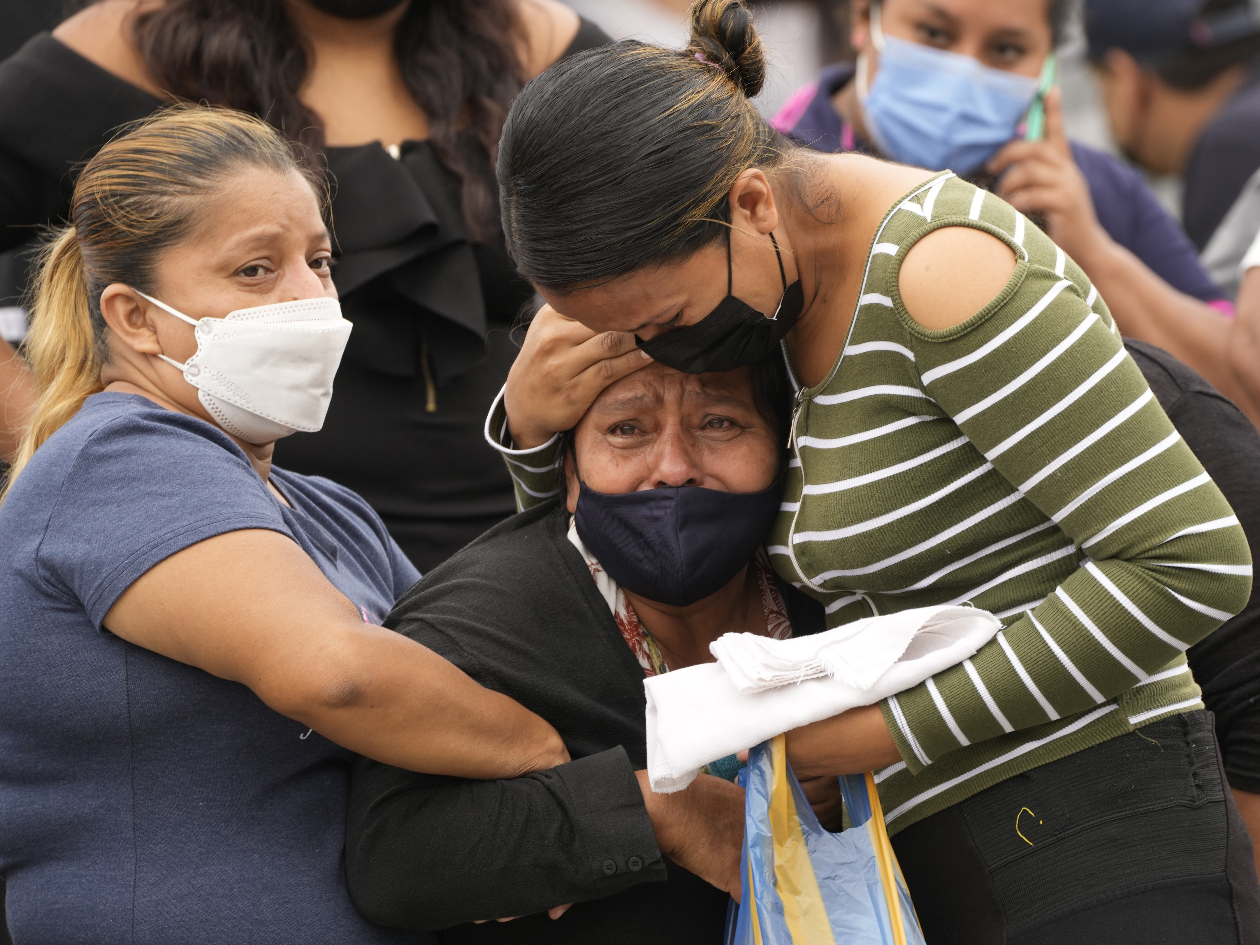 Relatives crying