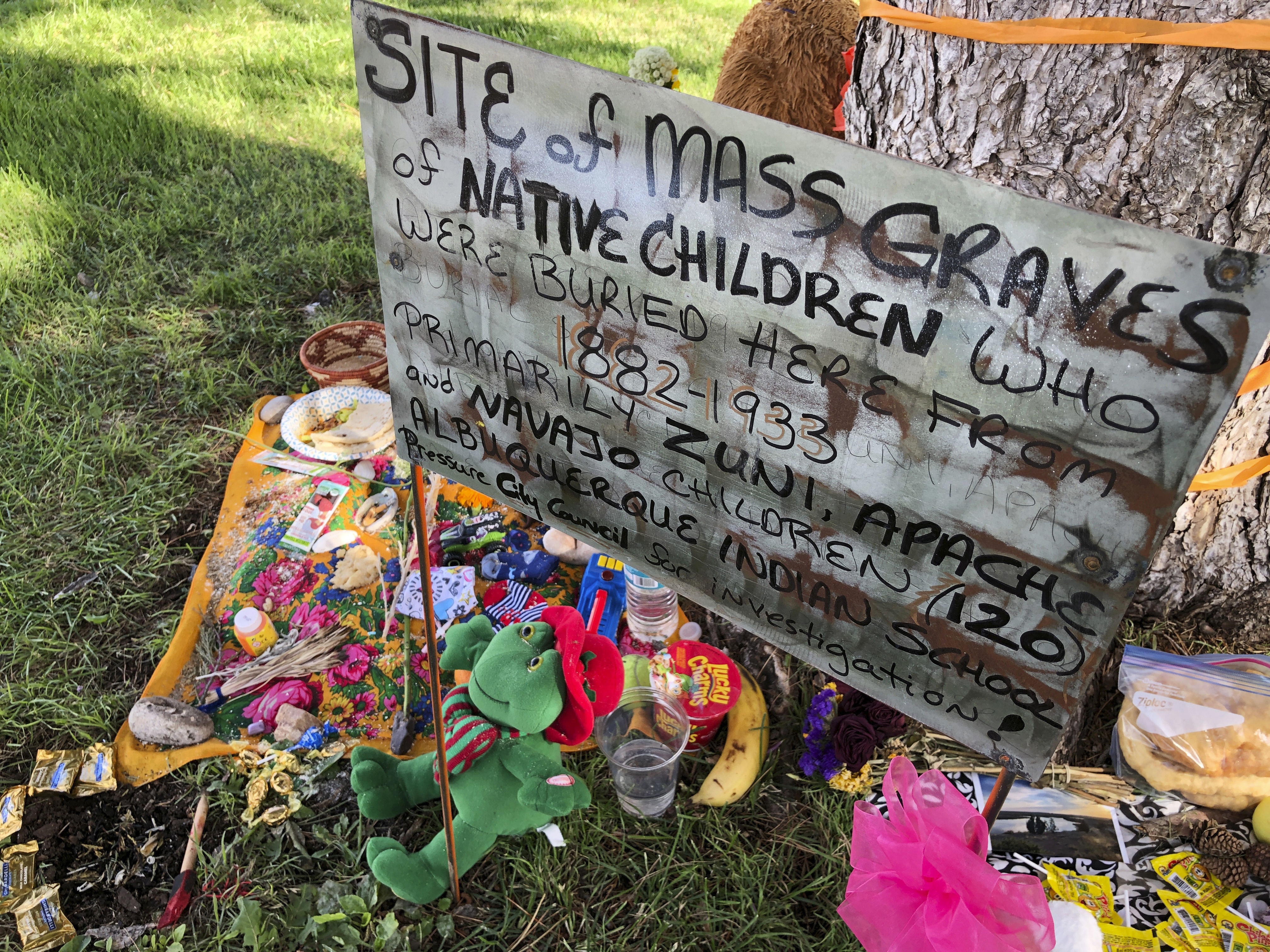 A makeshift memorial for the dozens of Indigenous children who died more than a century ago while attending a boarding school that was once located in Albuquerque, New Mexico