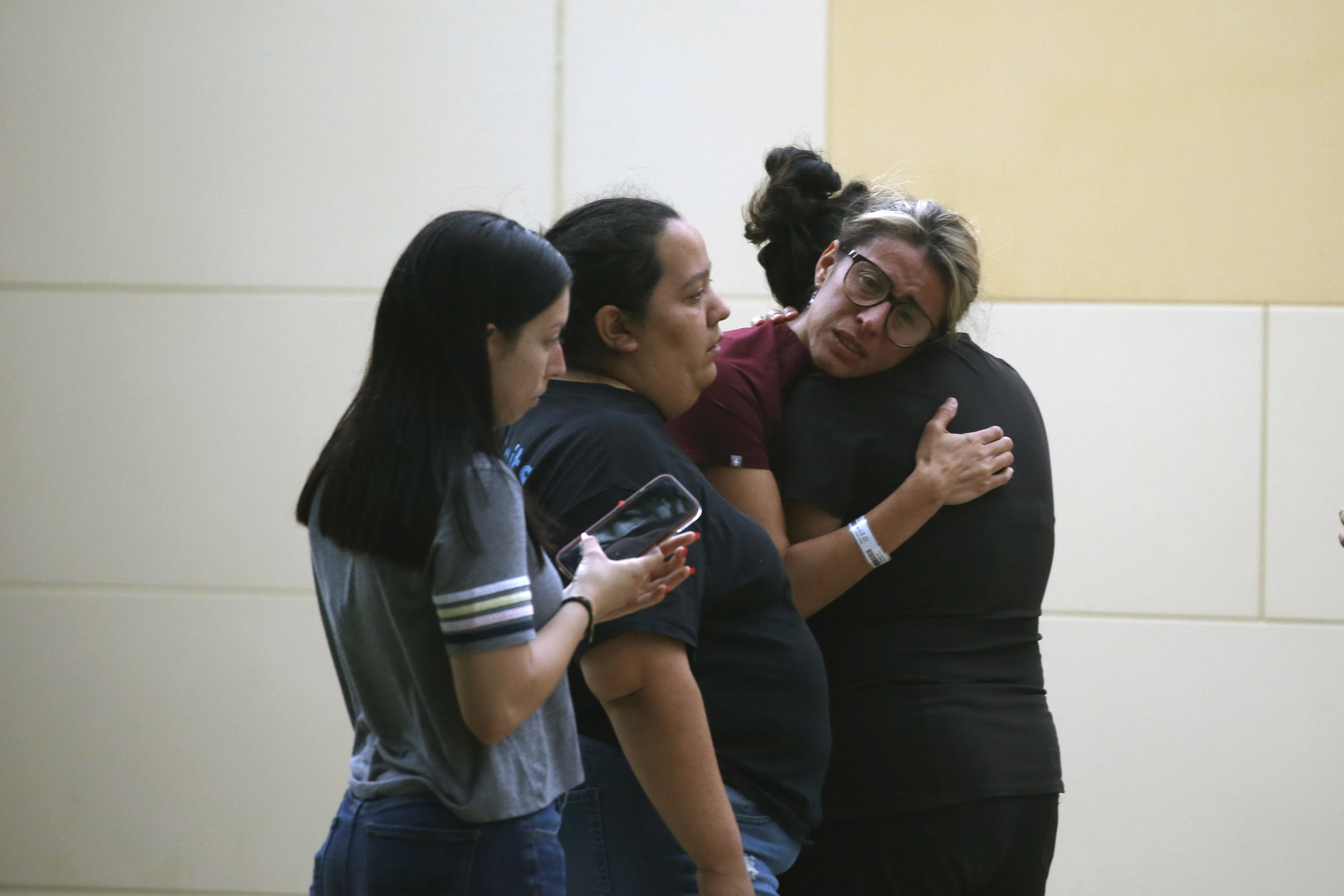People react outside the Civic Center following the deadly shooting at Robb Elementary School in Uvalde. Nancy Pelosi said the attack was ‘monstrous’