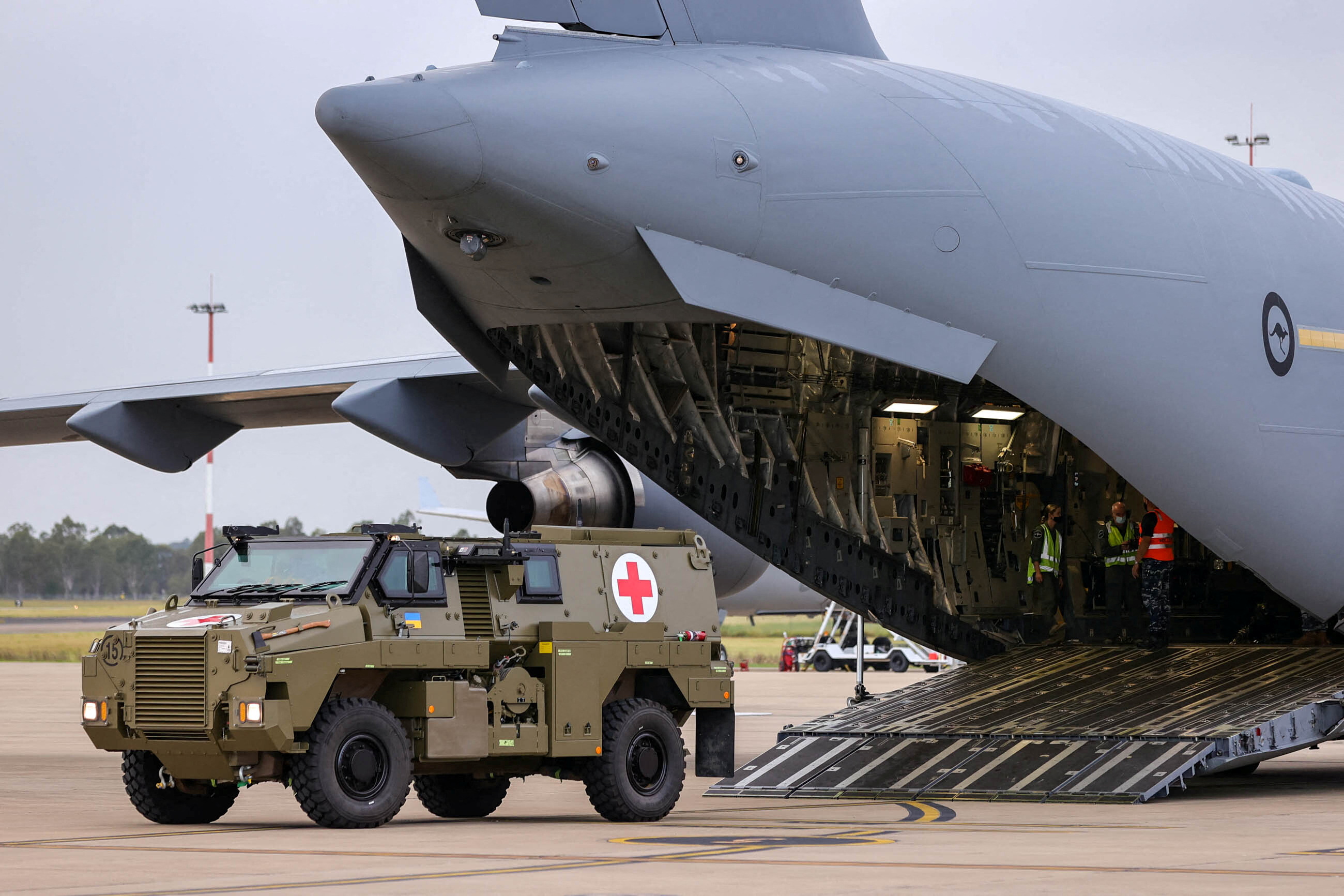 A Bushmaster PMV is loaded into a C-17 Globemaster which is headed for Ukraine ahead of an announcement from Defence Minister Peter Dutton regarding defensive military assistance to Ukraine in Brisbane, Australia, April 8, 2022