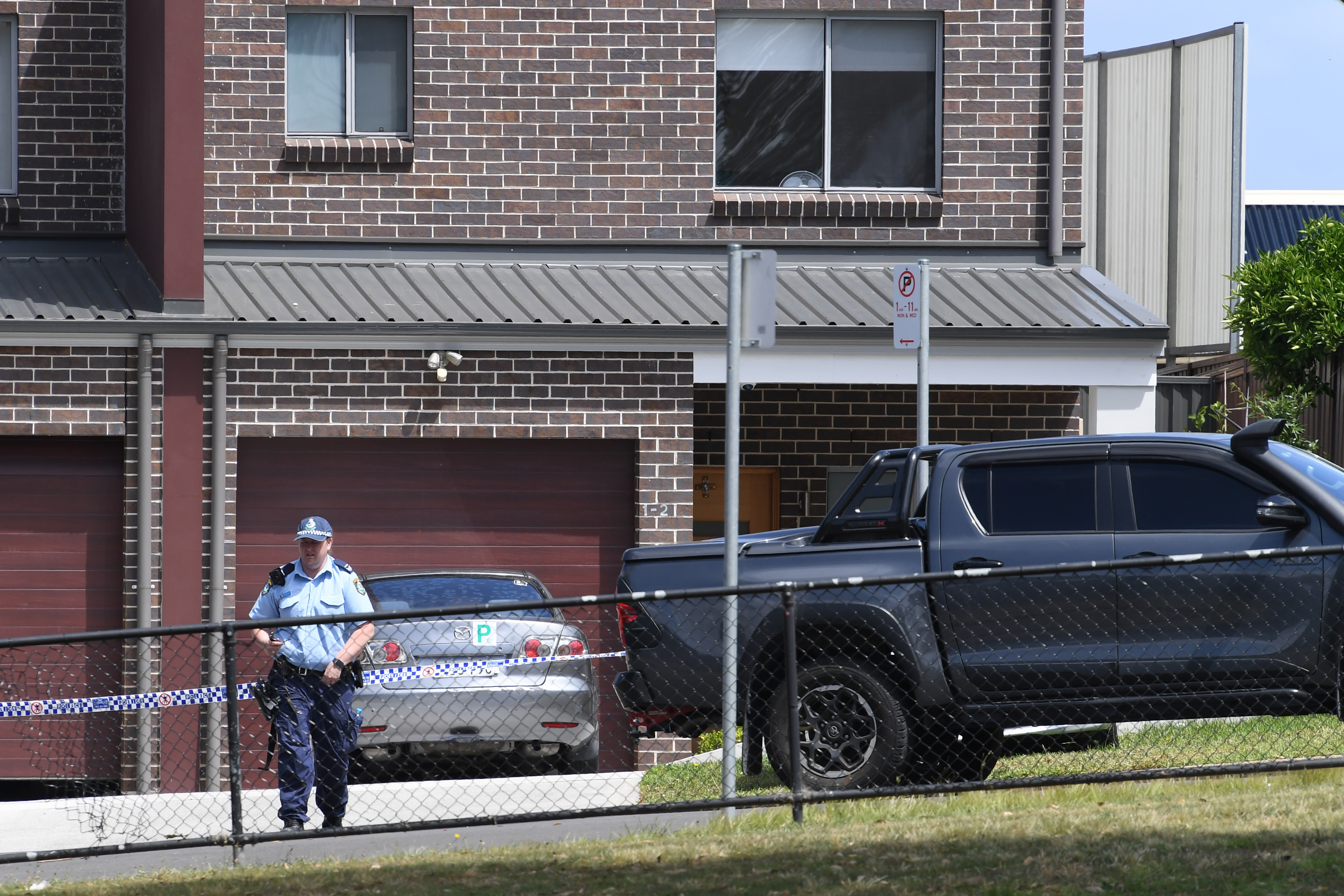 The cordoned off two storey house where Mejid Hamzy was killed in a drive-by shooting in October