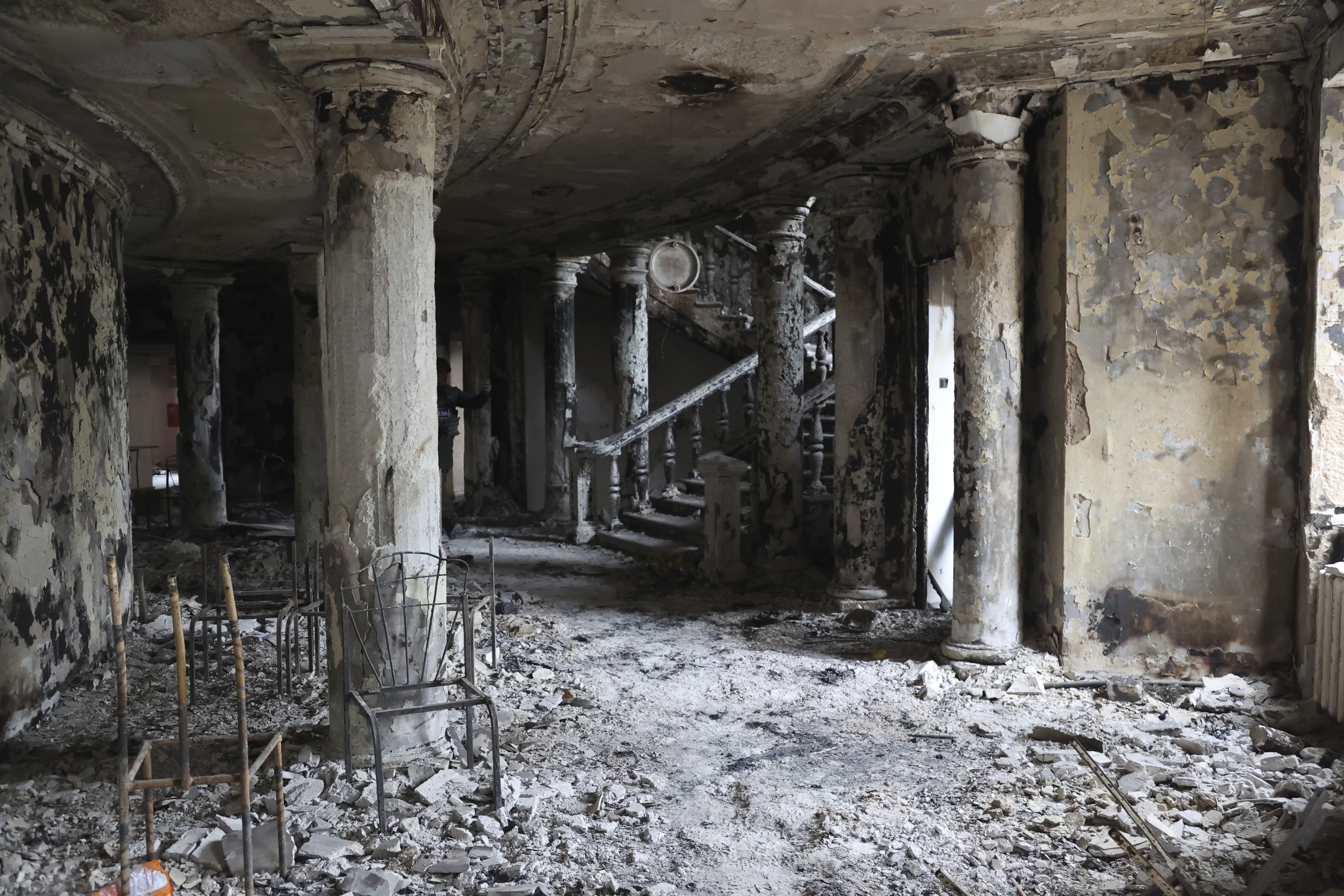 Debris covers the inside of the Donetsk Academic Regional Drama Theatre following a March 16, 2022, bombing in Mariupol, Ukraine, in an area now controlled by Russian forces, Monday, April 4, 2022