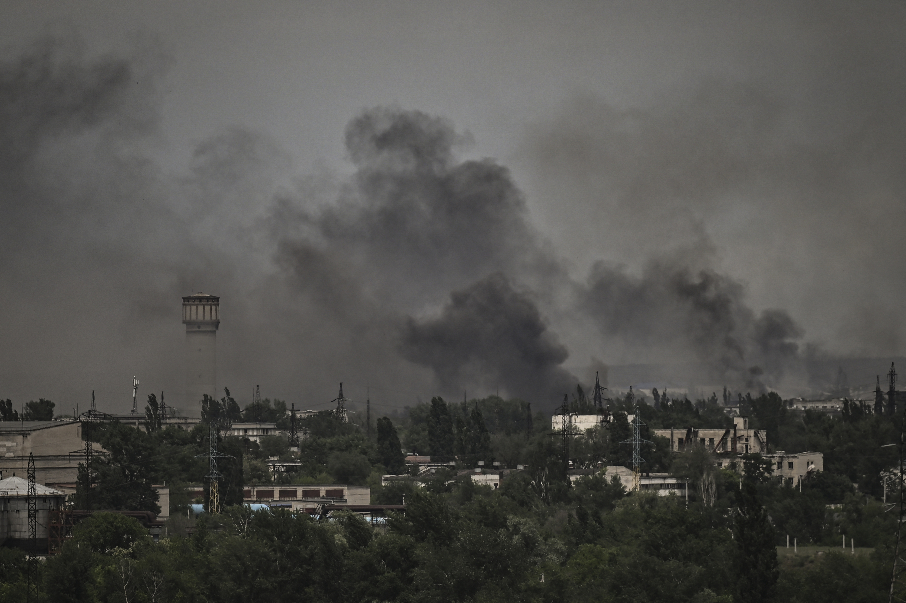 Smoke and dirt rise in the city of Severodonetsk during fighting between Ukrainian and Russian troops in the eastern Ukrainian region of Donbas on June 2, 2022