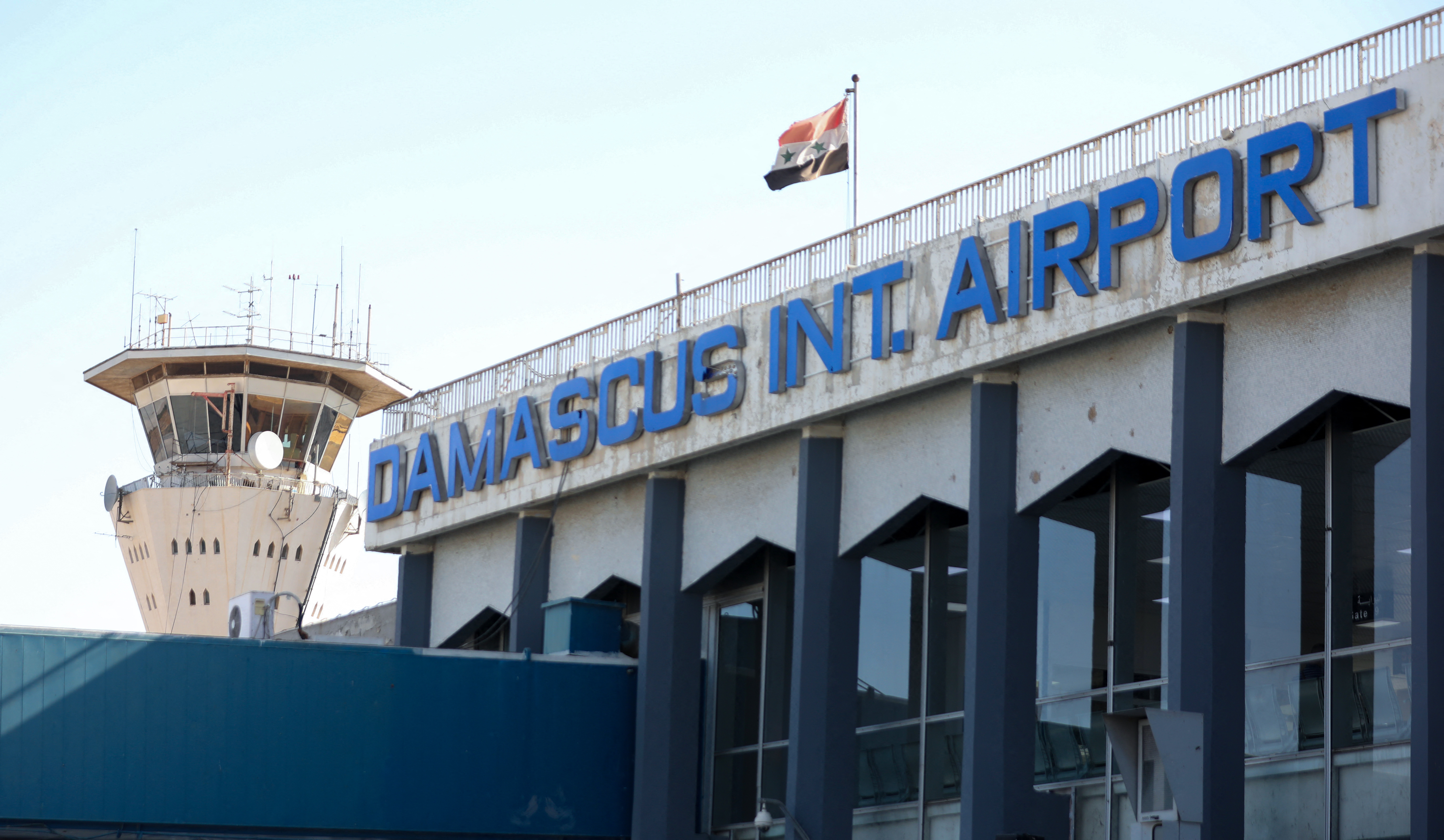 The Syrian flag flying at Damascus International Airport