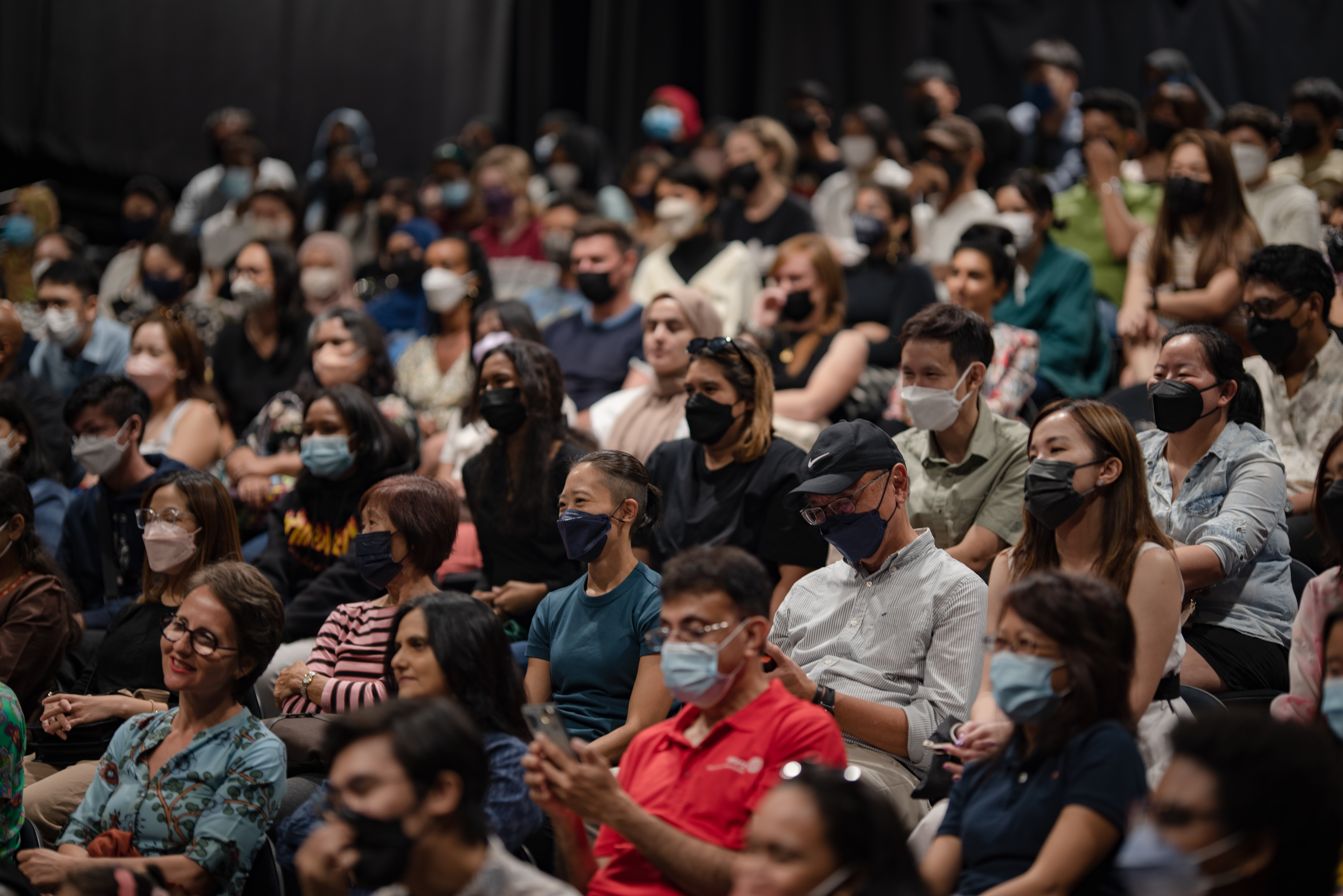 The audience watches Parastoo's latest performance in Kuala Lumpur