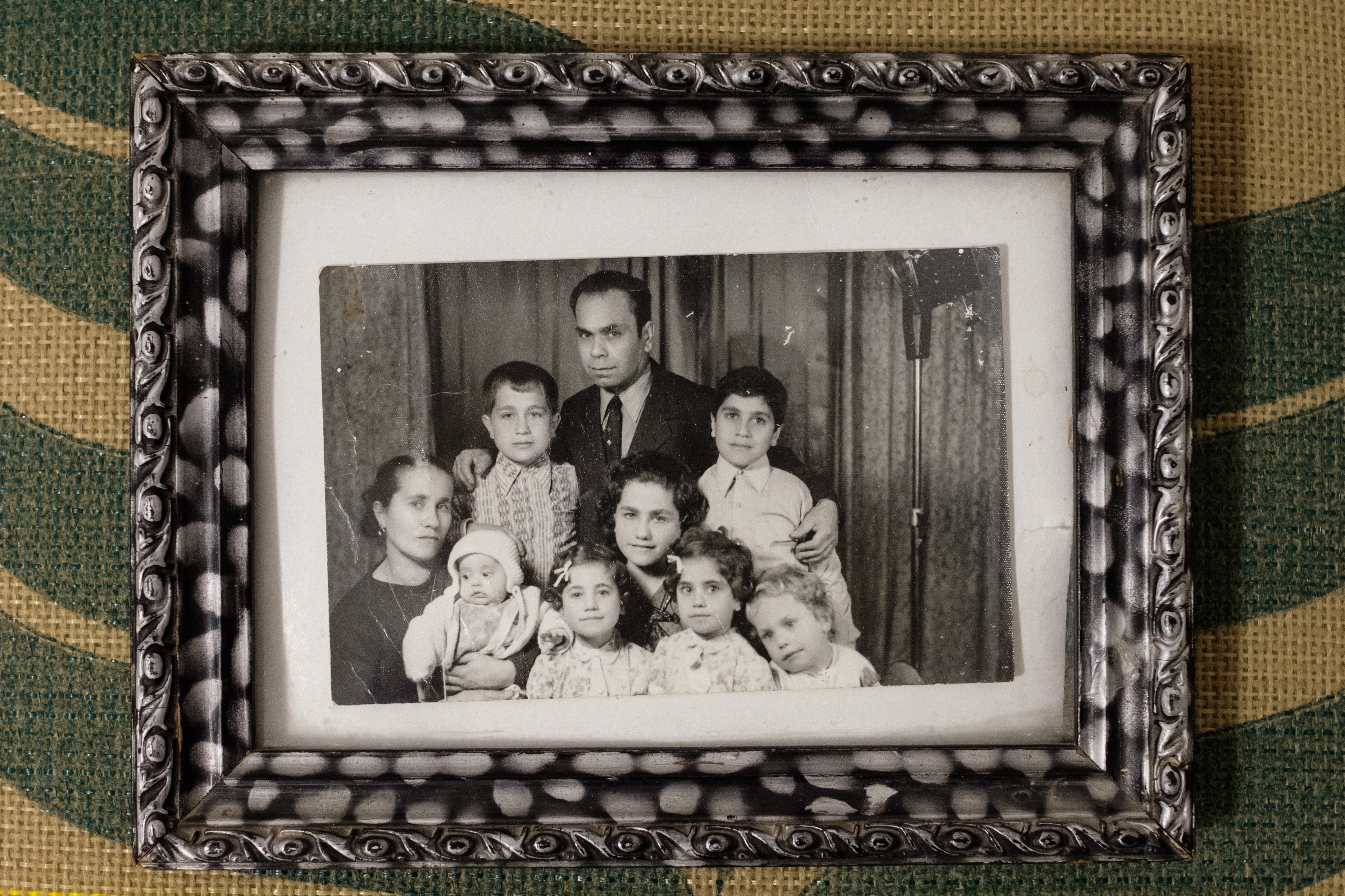 Portrait of Amaline and Wadih Ramia with their seven children. A photo Amaline said was made to send to Wadih’s brother who had emigrated to Brazil [Courtesy of the Ramia family]