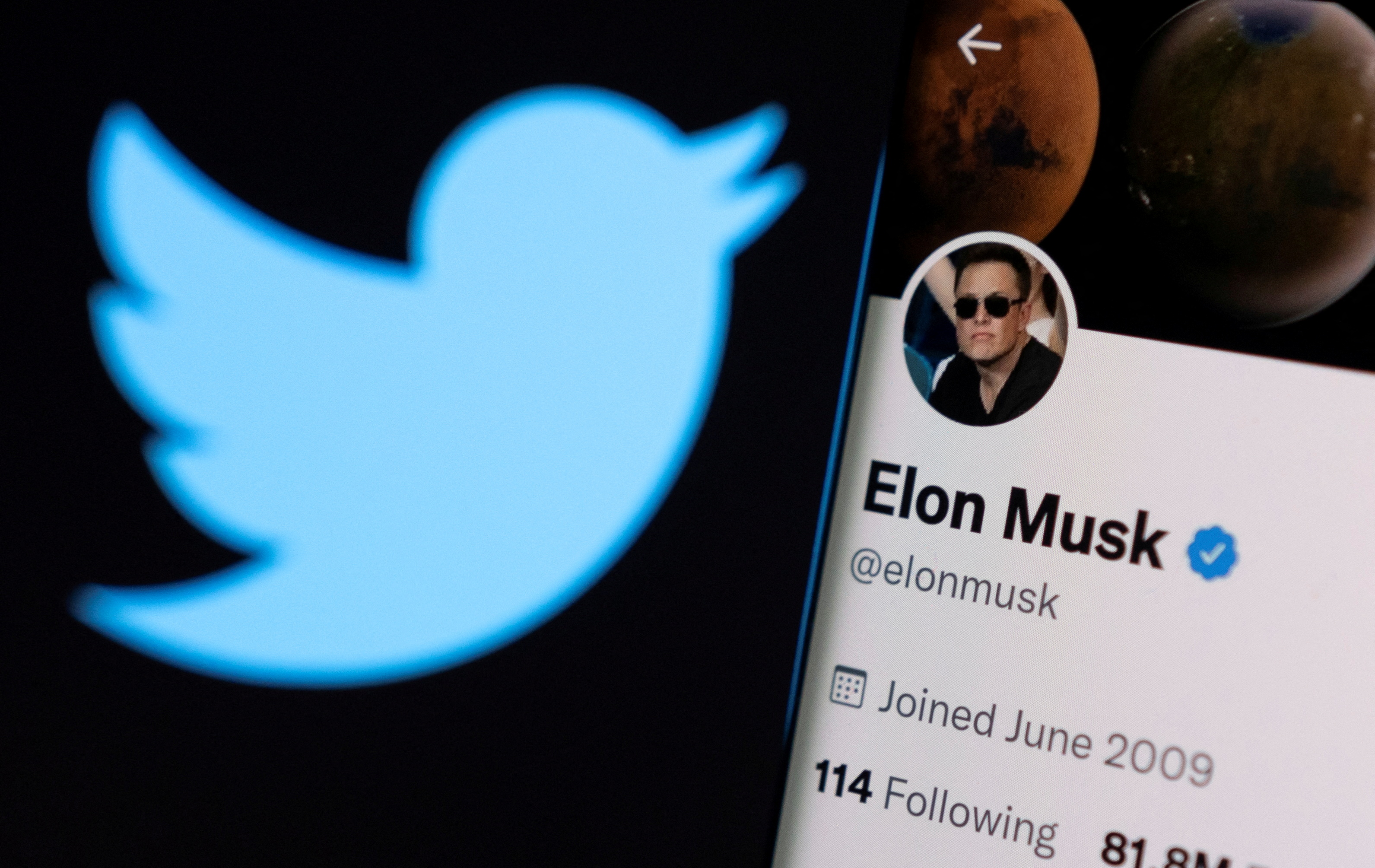 Elon Musk's Twitter account seen on a phone.