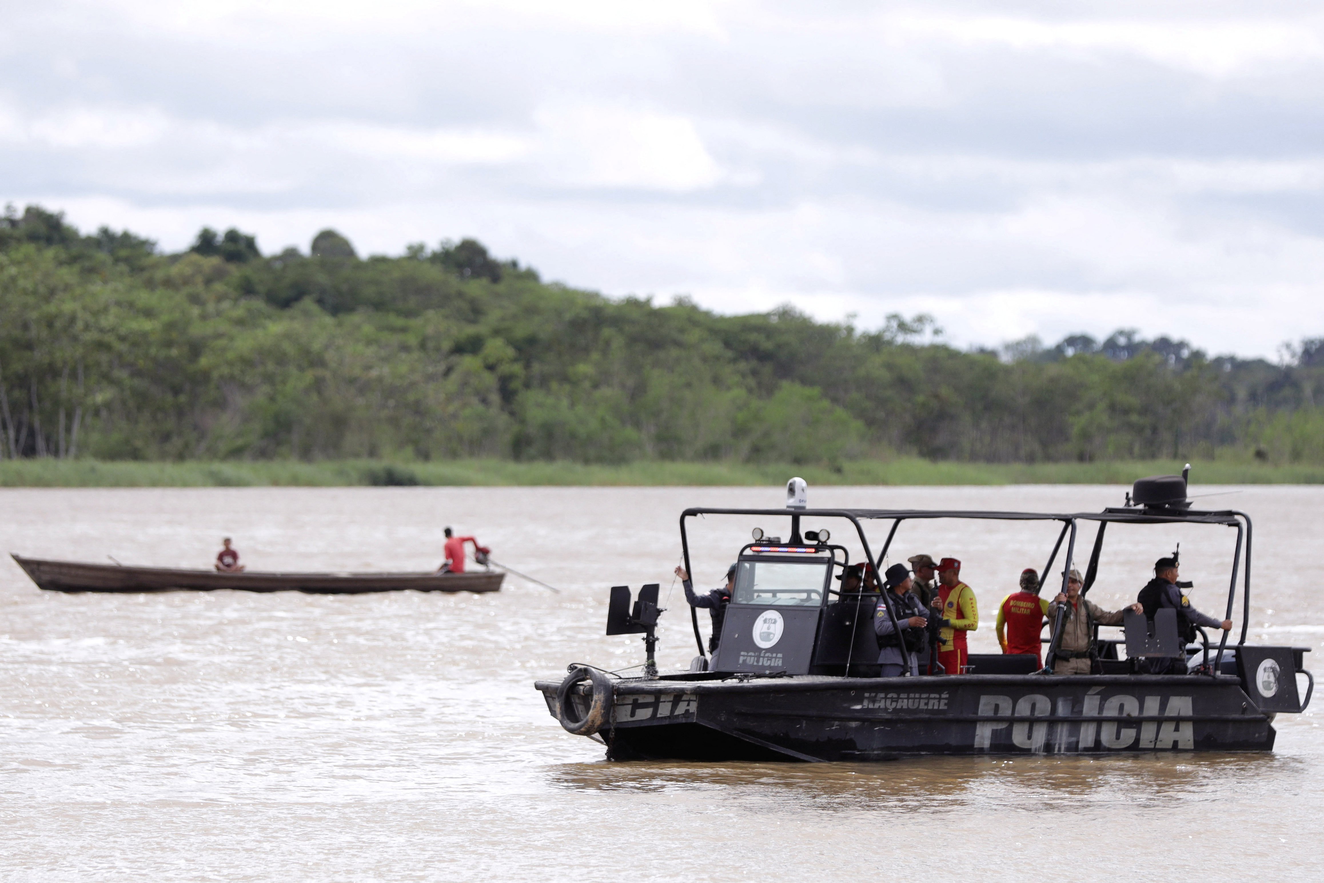 Police and rescue teams search by boat for British journalist Dom Phillips and indigenous expert Bruno Pereira, who both went missing while reporting in a remote and lawless part of the Amazon rainforest near the border with Peru, in Atalaia do Norte in Amazonas state, Brazil on June 11, 2022