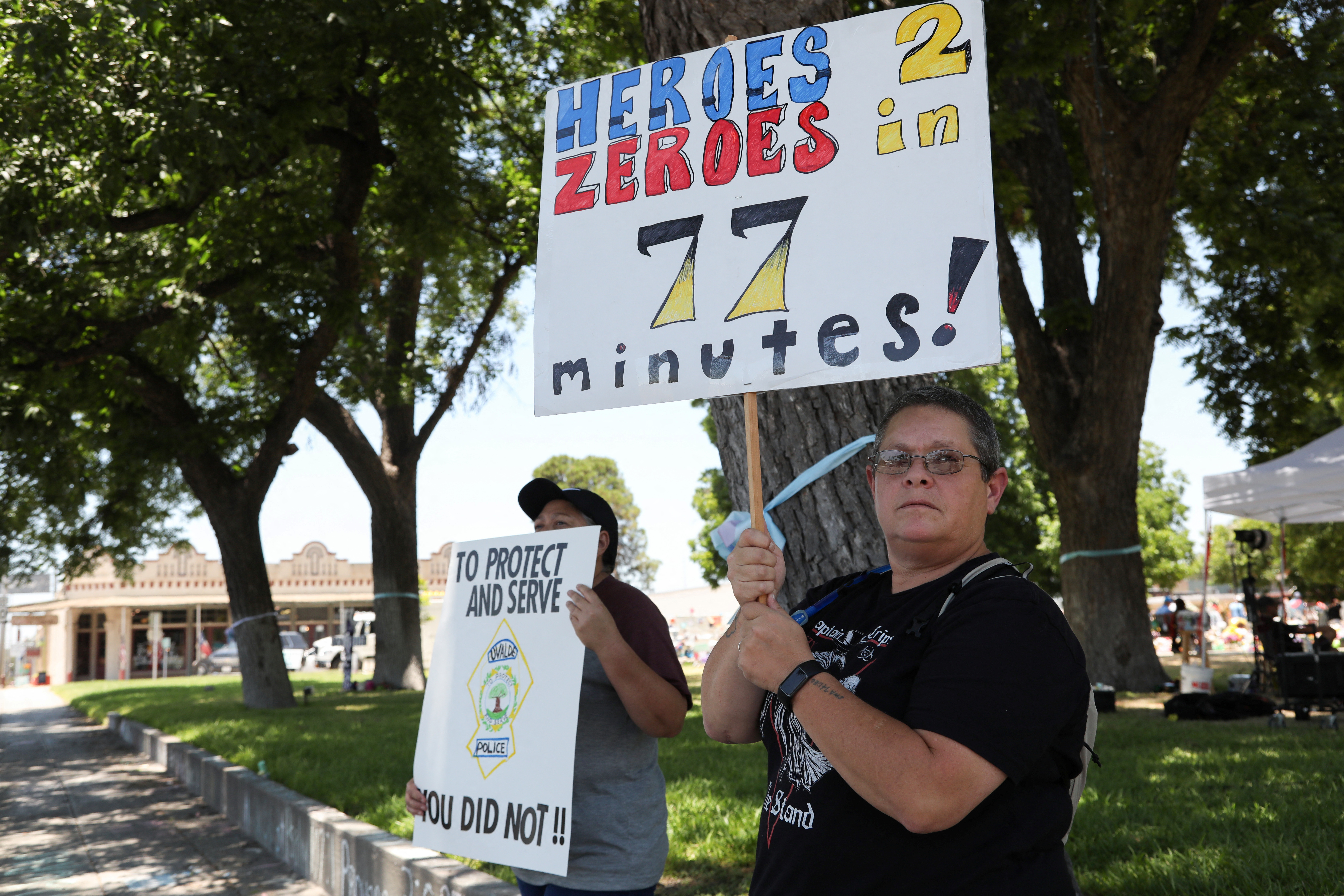 Man holding signs
