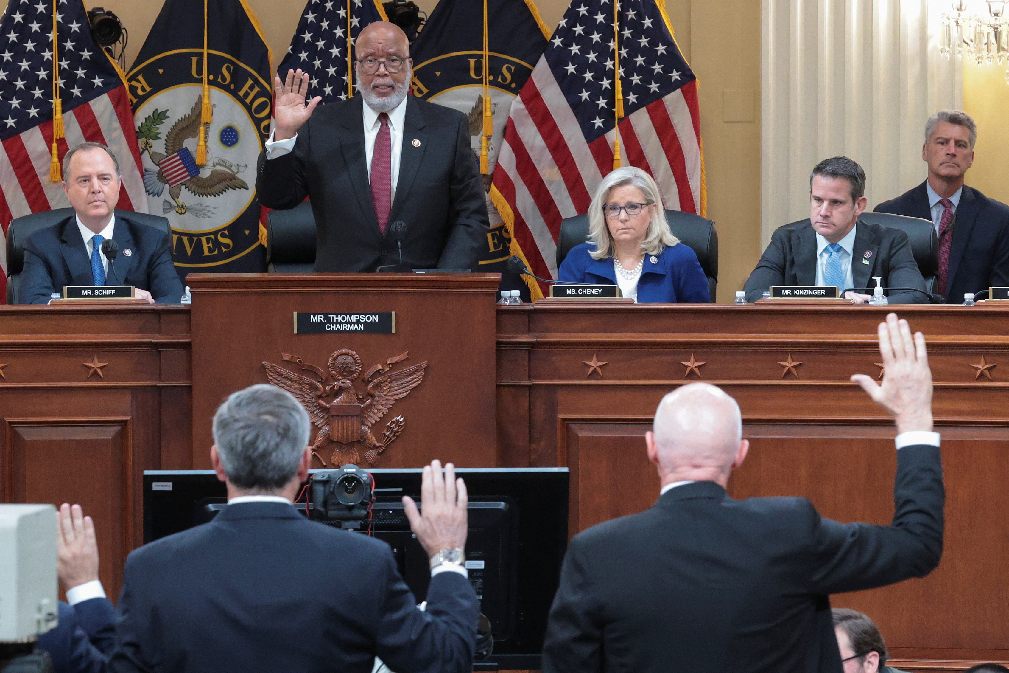 Chairman Bennie Thompson swears two witnesses as other panel members look on.